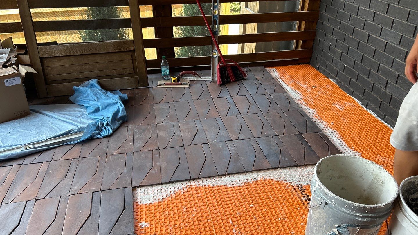 Terra cotta porch  by Footprints Floors of Nashville