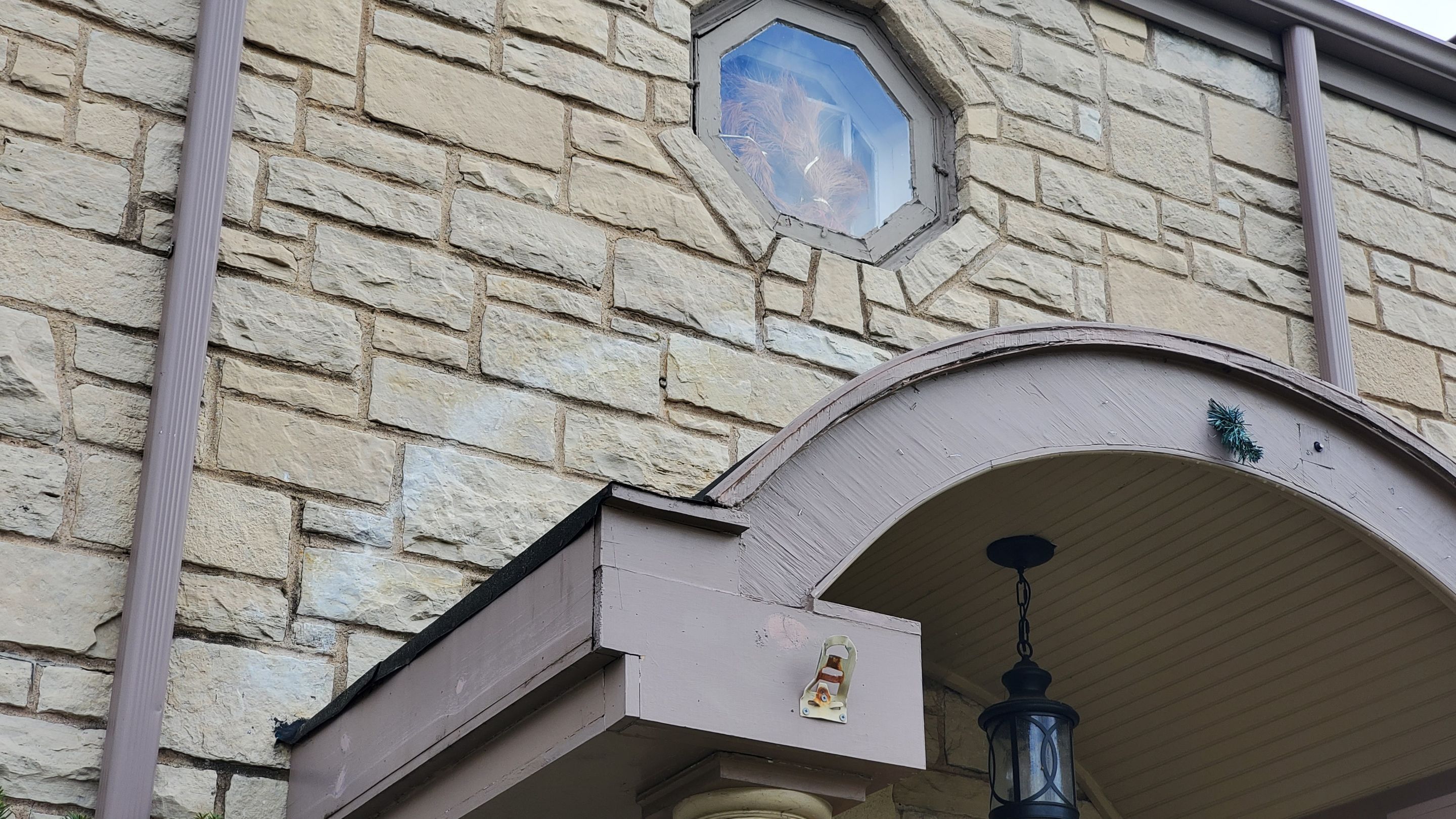 Wood cleaning and staining using Armstrong cloark oil stain by Northern Power Washing LLC.