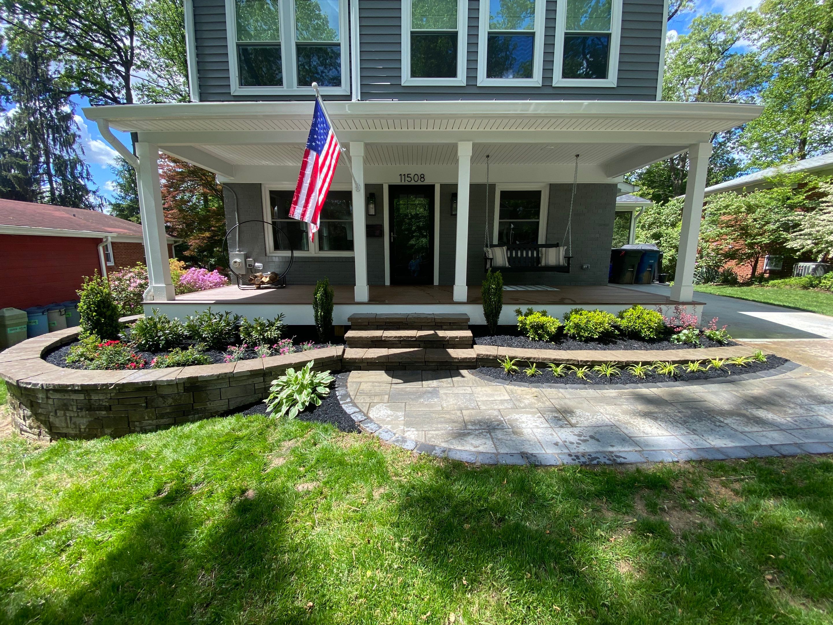Retaining wall, walkway, small patio and landscape install by The Smet Companies, LLC