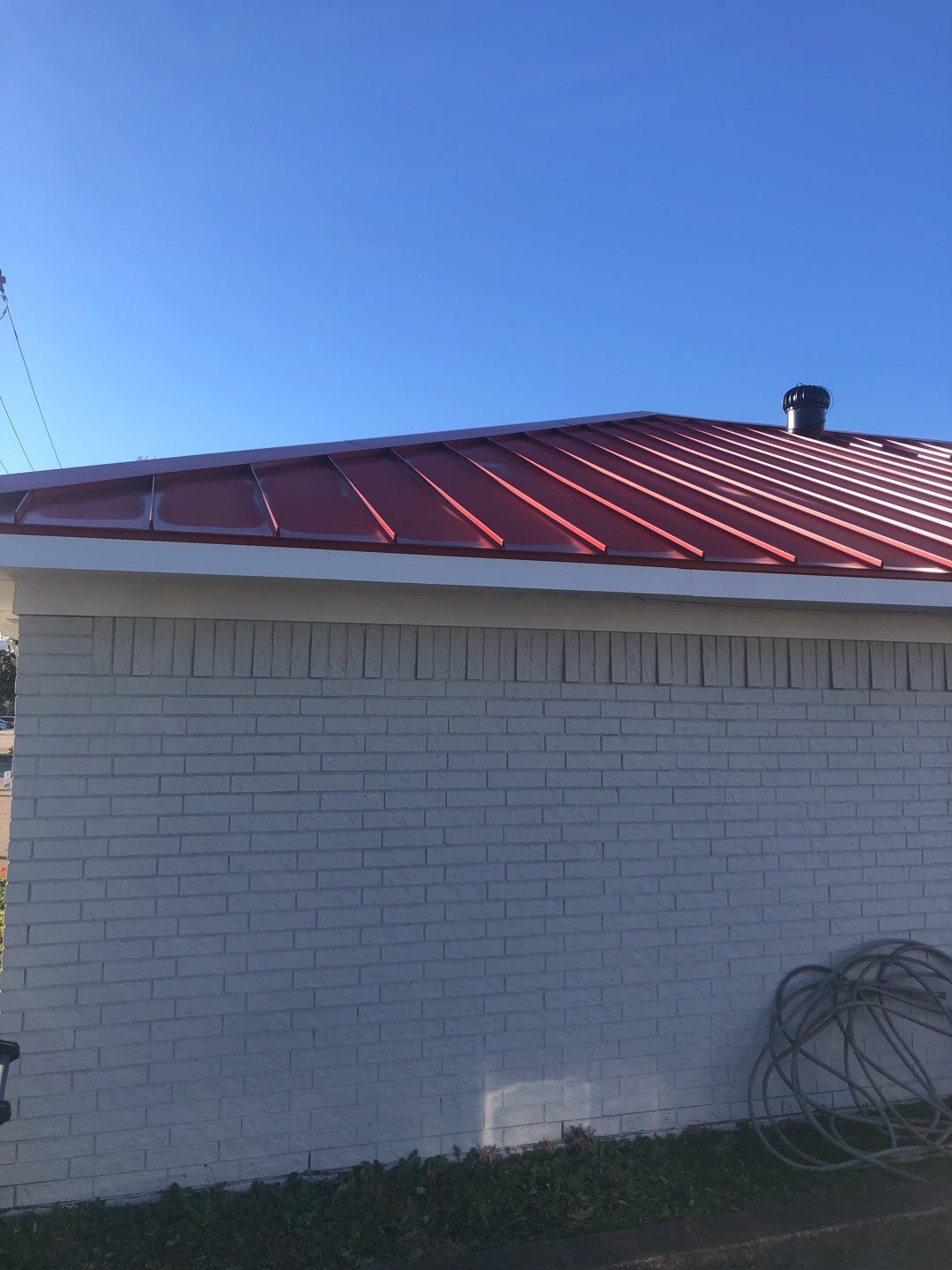 Commercial metal roof by Springtree Restoration 