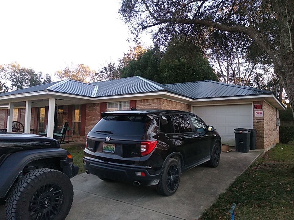 Residential Roofing Installation using Roof Replacement by American Roofing & Construction LLC