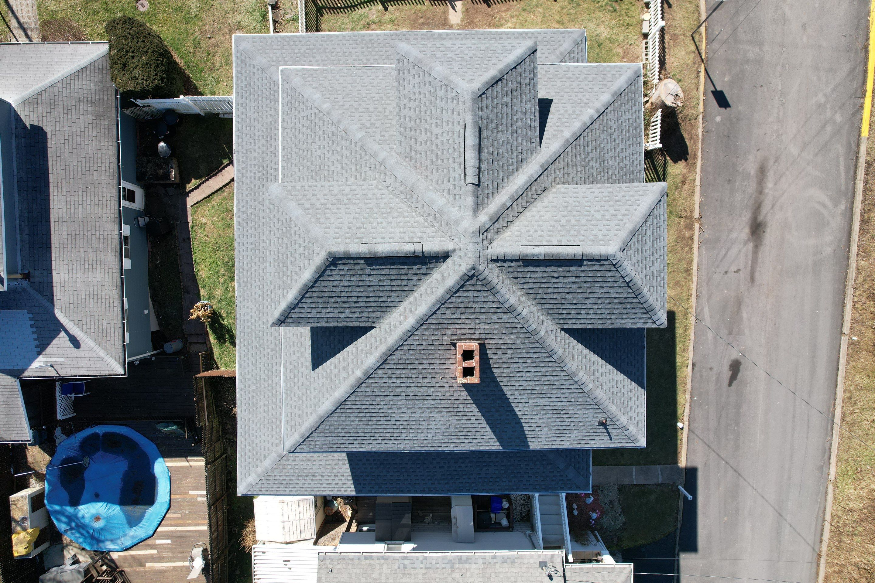 Residential Roofing Installation using GAF Timberline HDZ Pewter Gray by Rainstoppers Roofing