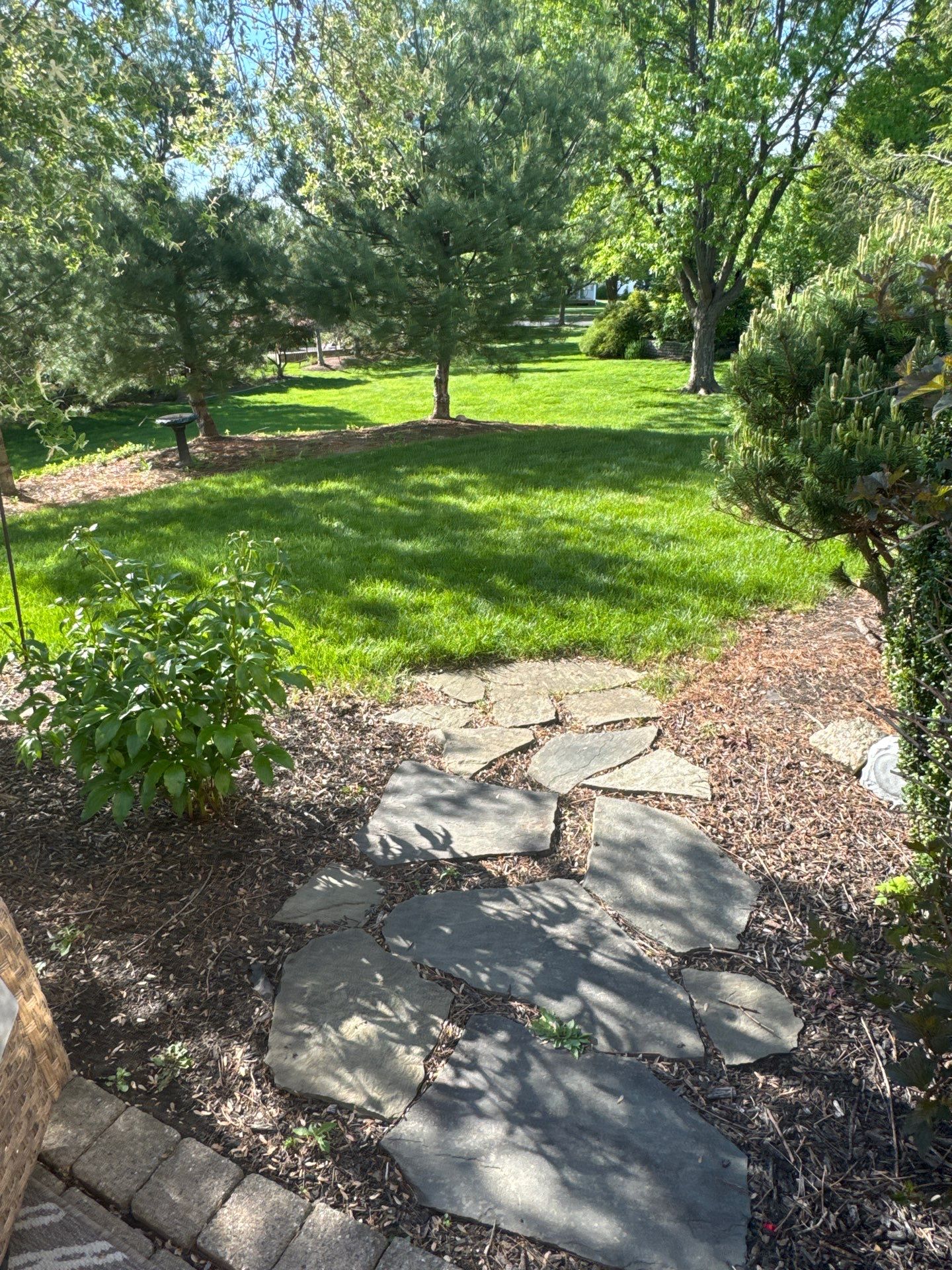 Backyard Retreat: Techo-Bloc Patio + Firepit Lounge by Saylor’s Lawn & Landscape