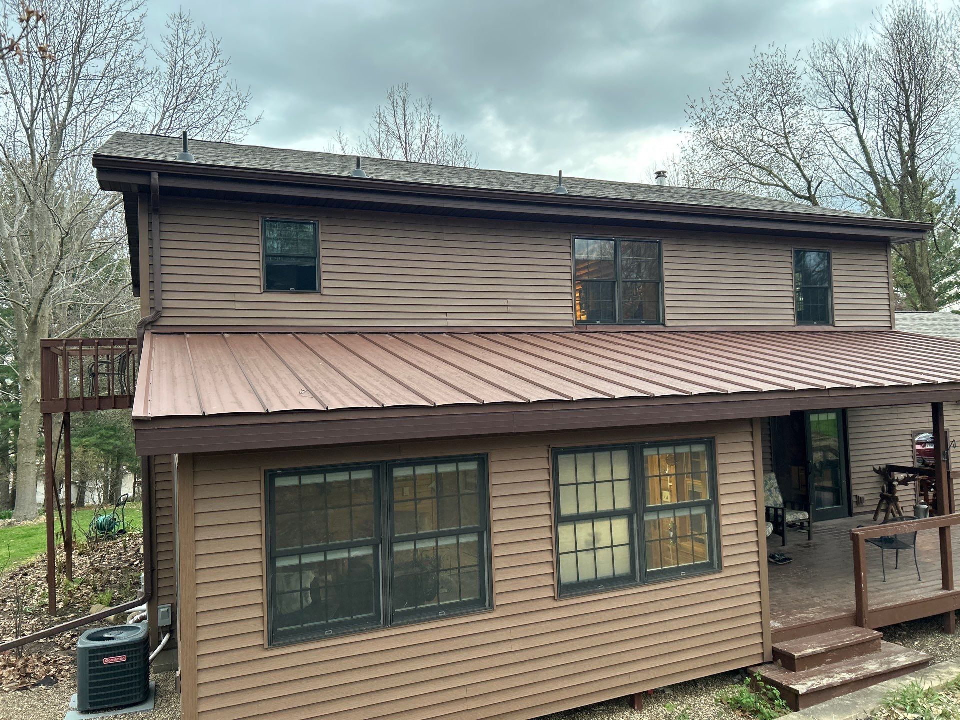 Pella Window installation using Pella Lifestyle wood/Aluminum window by United Windows and Siding LLC