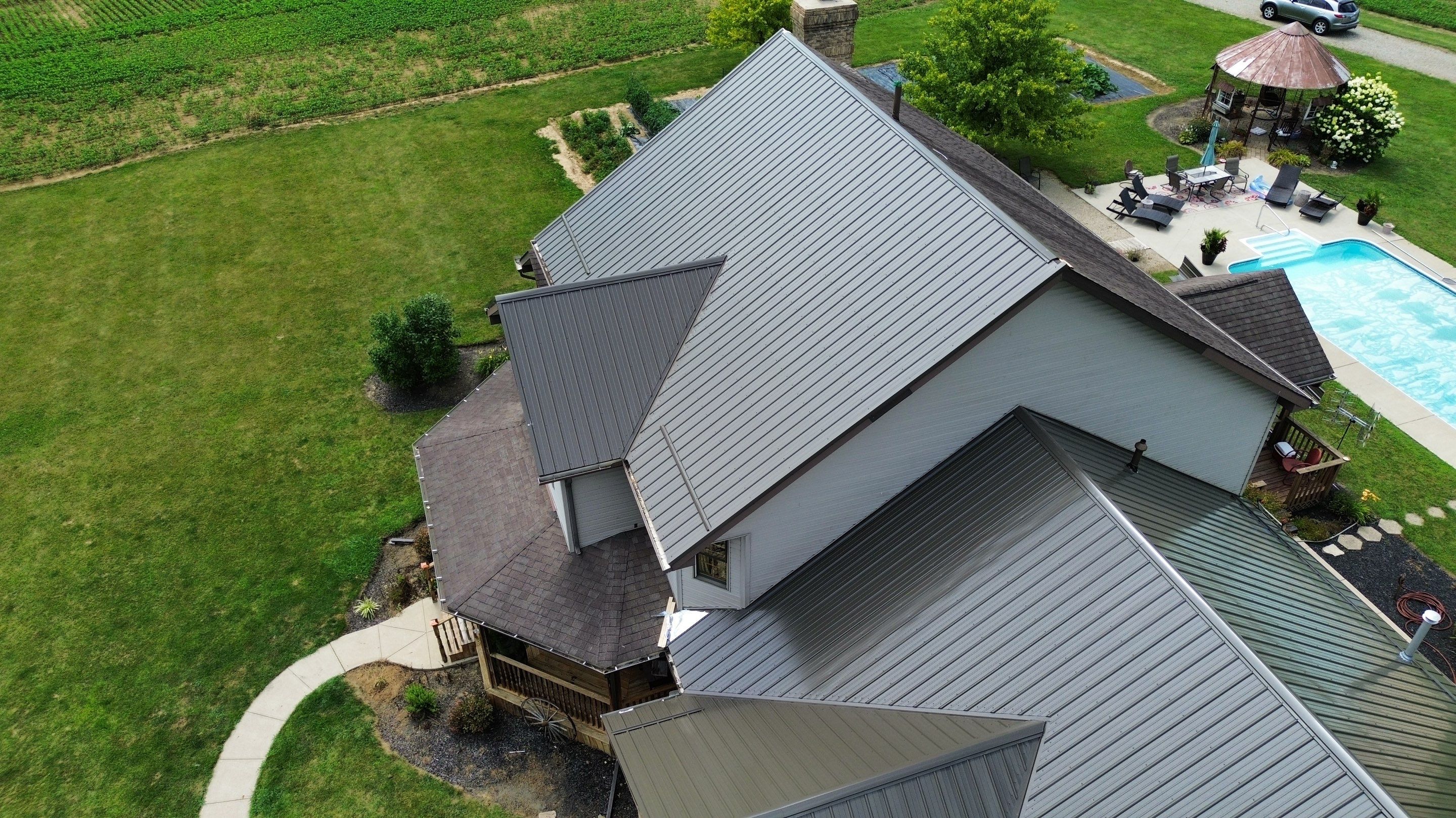Residential Roofing Installation using Performance Panel Metal - Burnished Slate by RoofX 