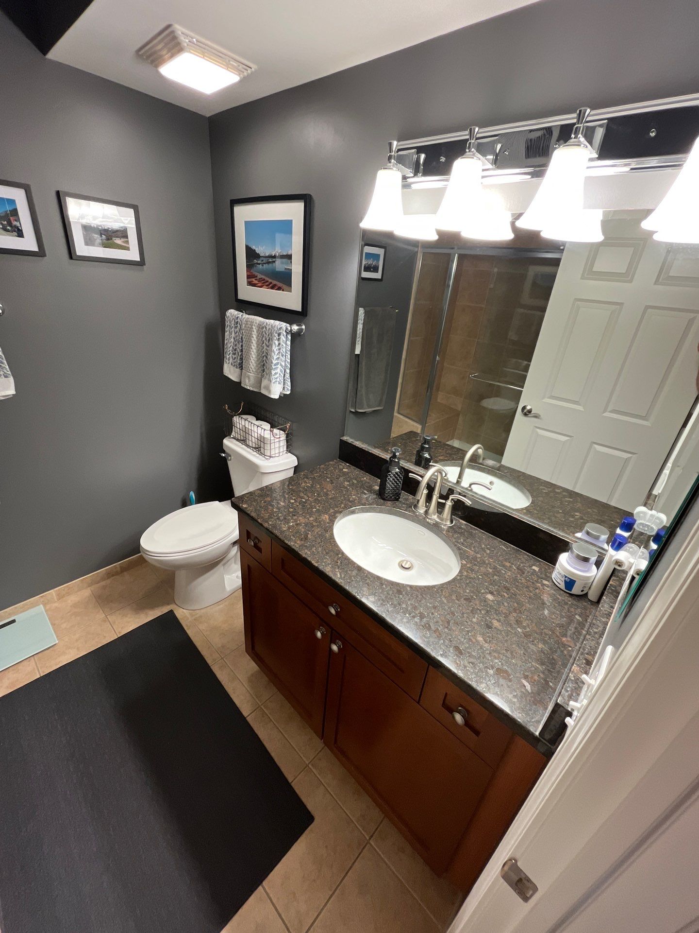 Double Bathroom Makeover by Snap Home Solutions