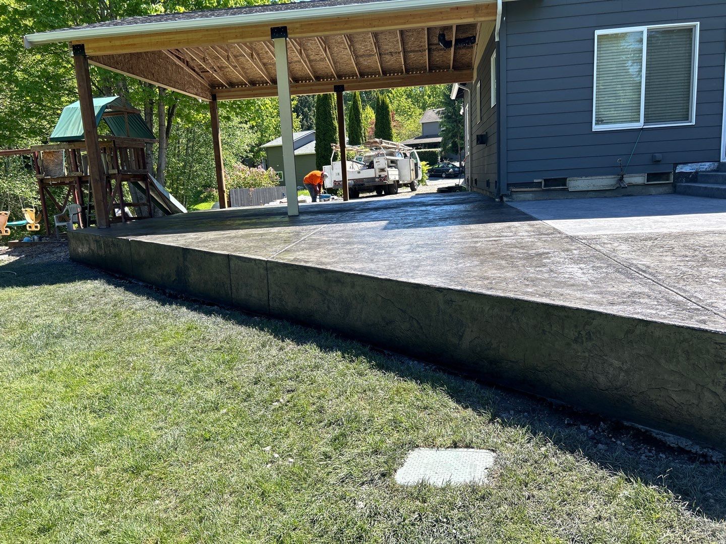 Ty | Concrete Patio by Jireh Asphalt & Concrete Inc 