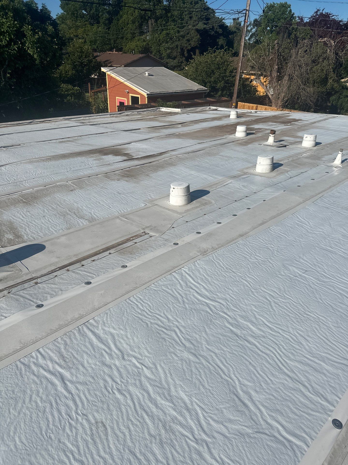 Residential Flat Roof Installation using GAF 60Mil TPO  by Orezona Building & Roofing Company, Inc.