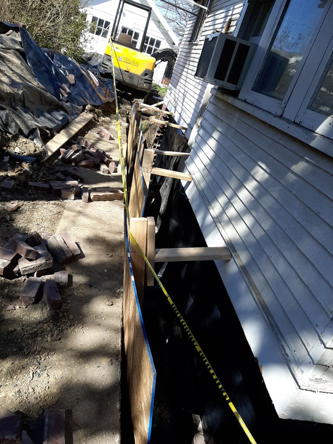 Basement Wall Rebuild with Exterior Waterproofing by Toledo Basement Repair