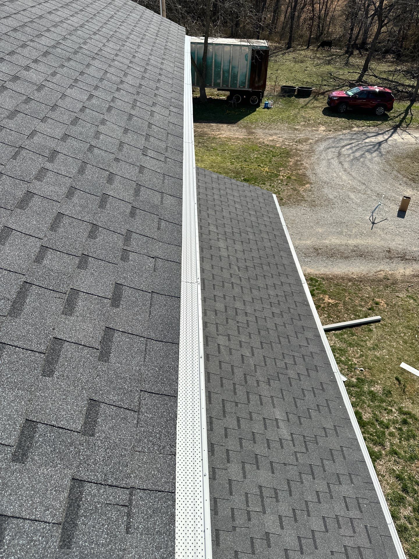 Residential Roofing & Downspouts Install  by Titan Commercial & Residential Roofing 