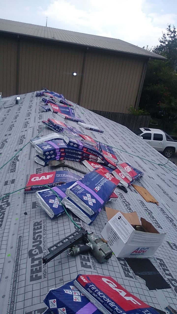 Residential Roofing Installation using Roof Replacement by American Roofing & Construction LLC