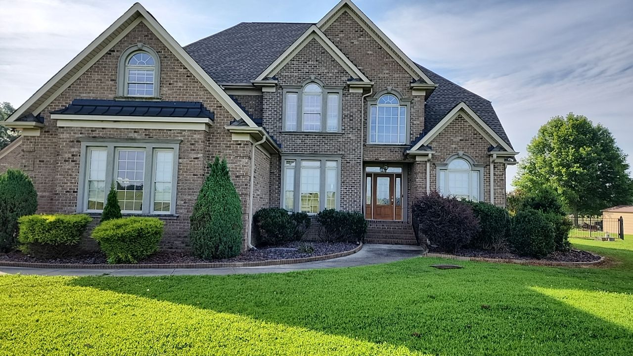 House Wash using cleaner by Power Wash Masters LLC