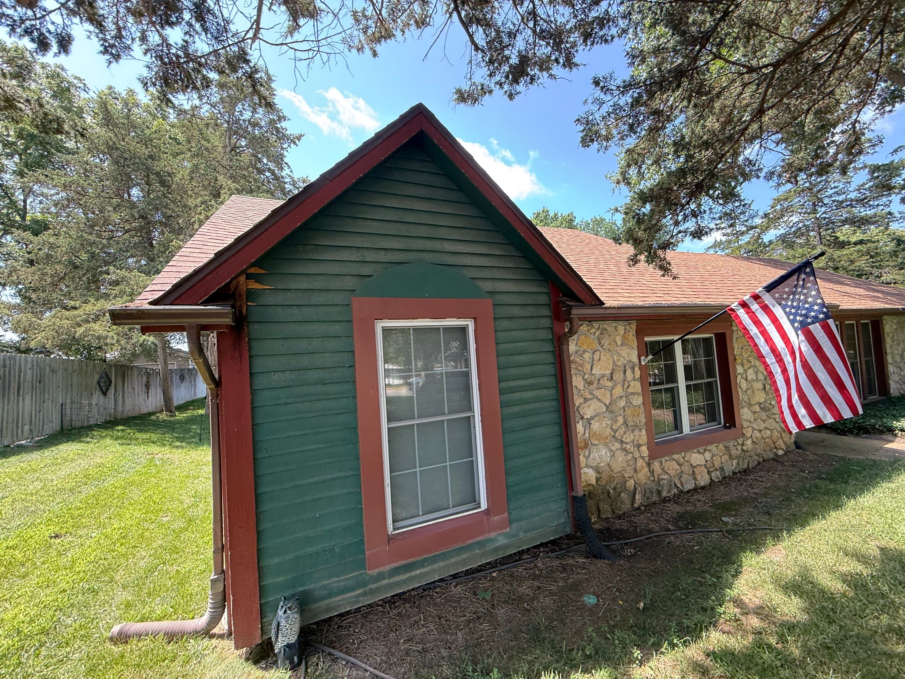 Wood siding refresh by Pezley Painting