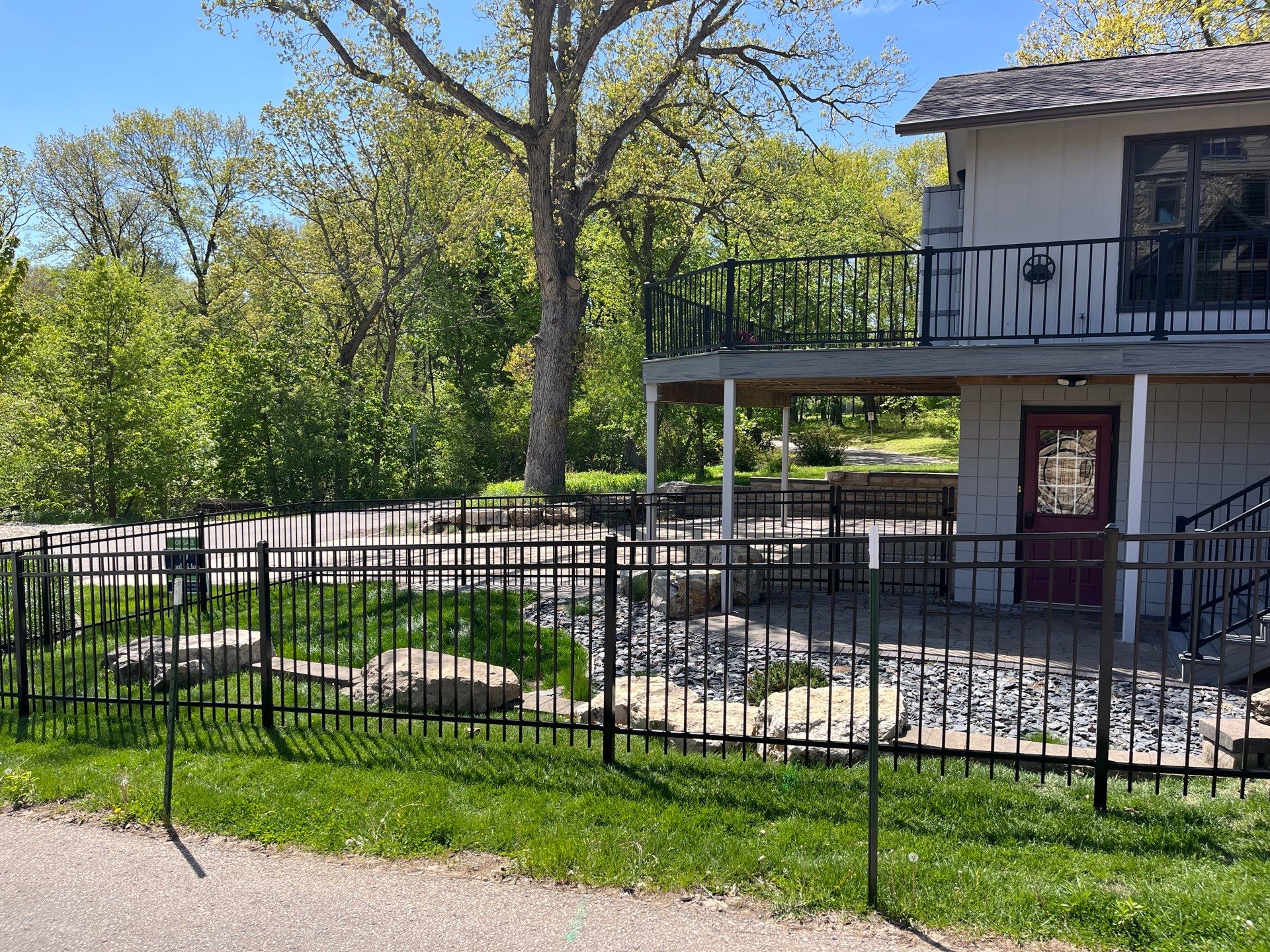 Ornamental Black Metal Picket Fence Installation in Cedar Falls by Perfect Picket Fence and Stain