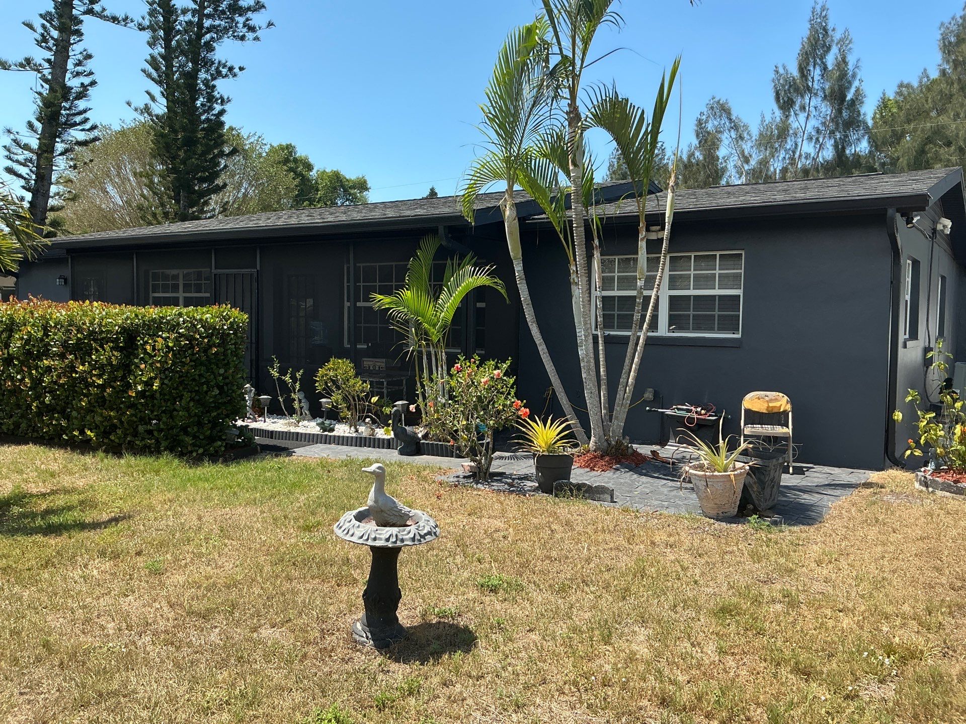 Black 7-Inch Gutters with Matching Downspouts in Fort Myers FL by Gutter Professor by Gutter Professors
