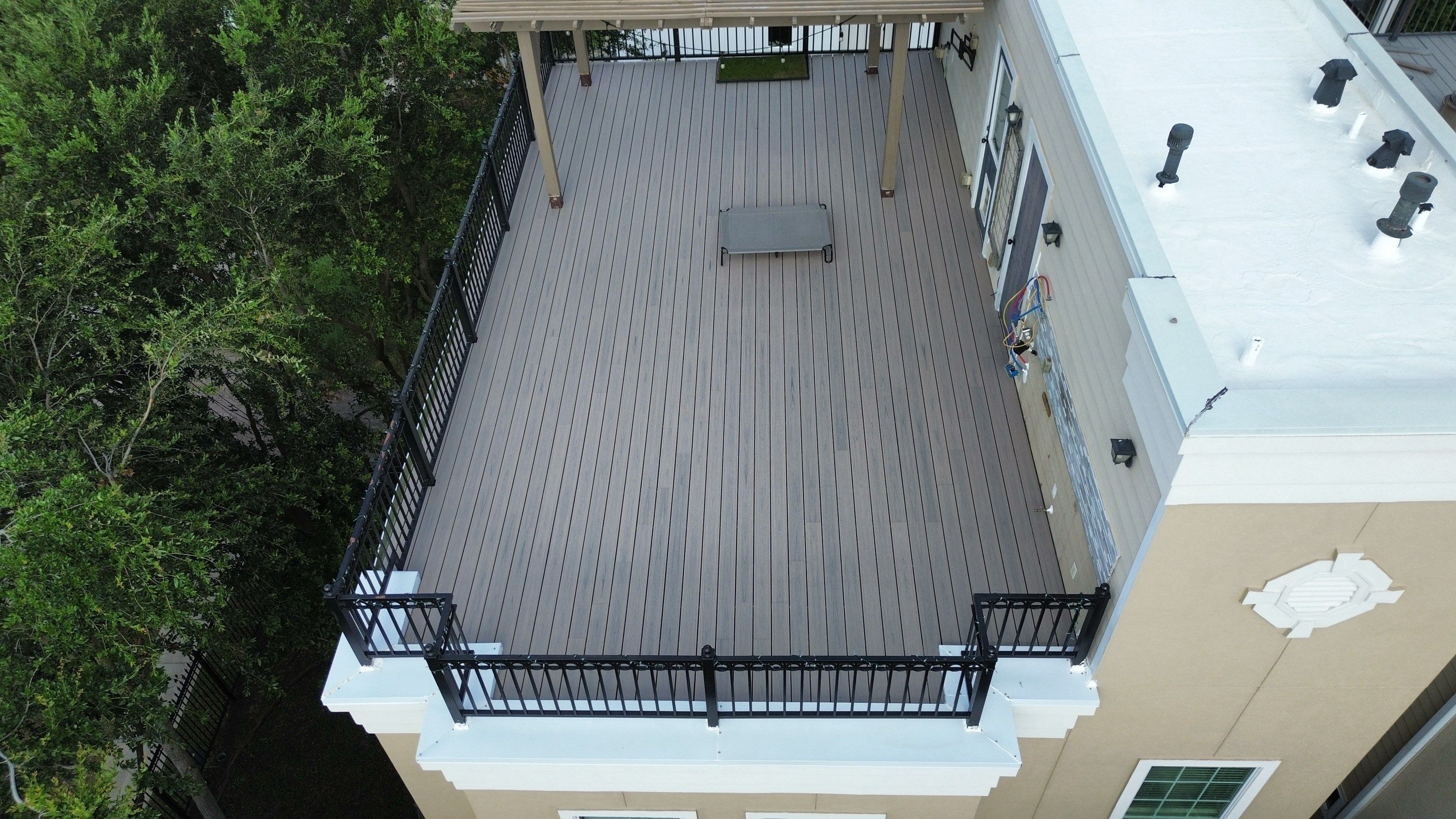 TREX Deck Patio by Houston Roofing & Construction