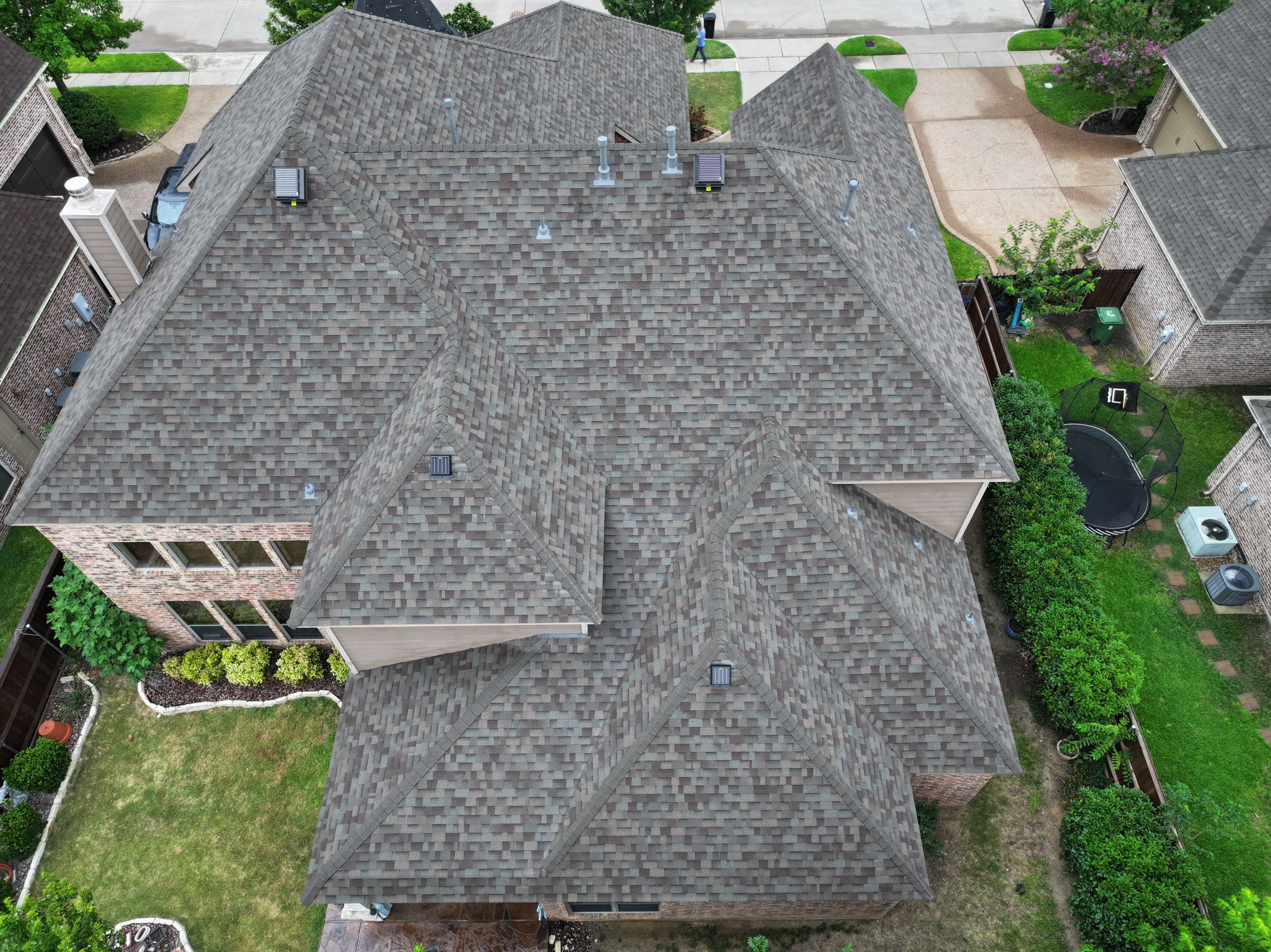 Installing Custom copper turret and Malarkey Vista Class 4 shingles Hail Damage Upgrade by Becker Roofing and Exteriors