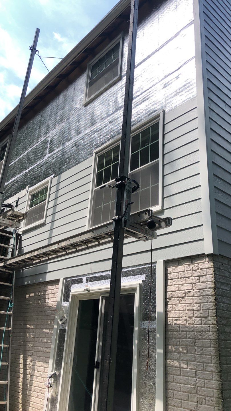 Exterior Home Makeover using GAF Timberline HDZ, GAF Decotech, and James Hardie Siding by American Home Contractors