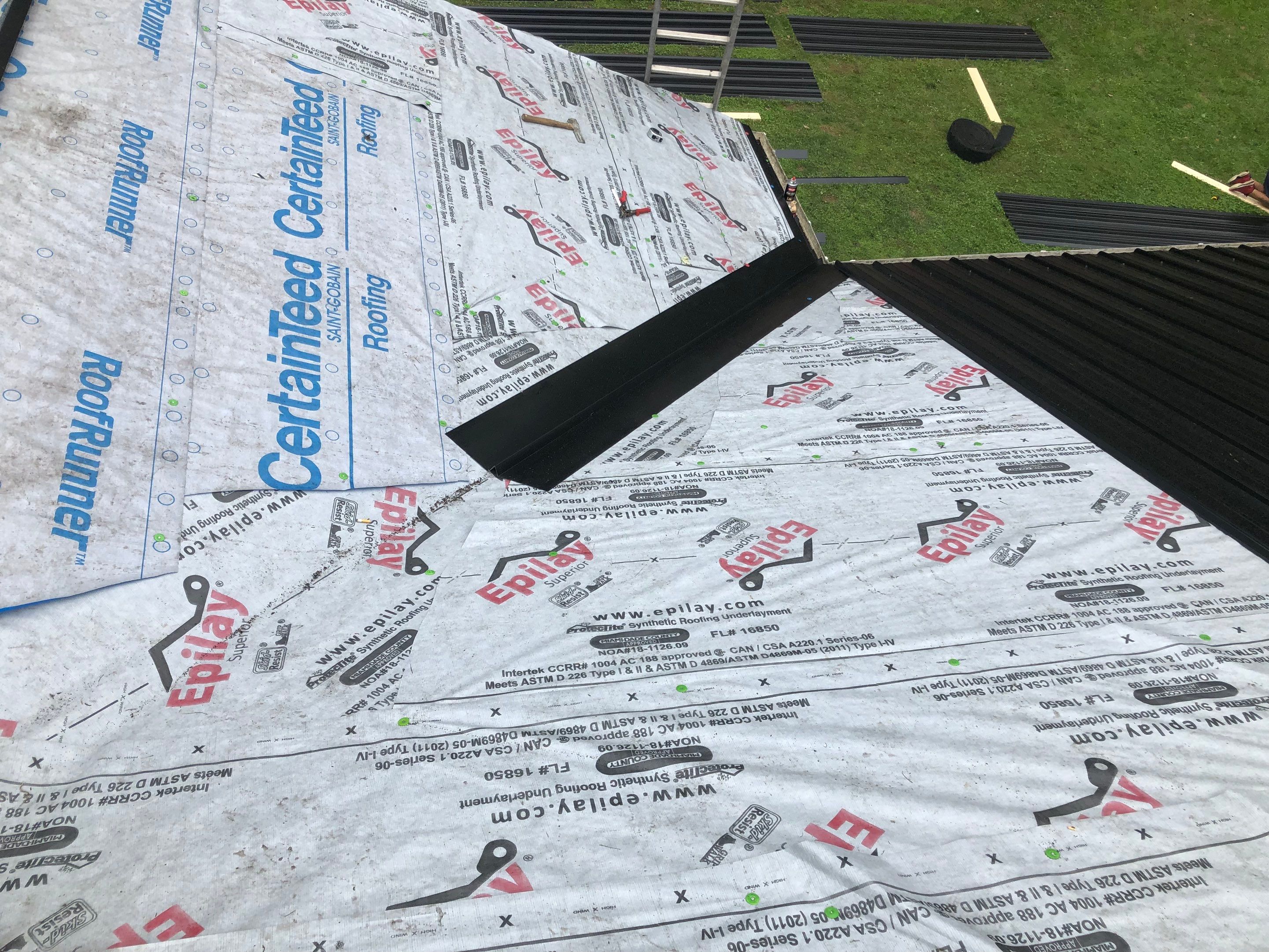 Metal Roof and Vinyl Siding, Soffit, Gutters using LifeTite Premium metal roofing  by Secure Construction Company Inc