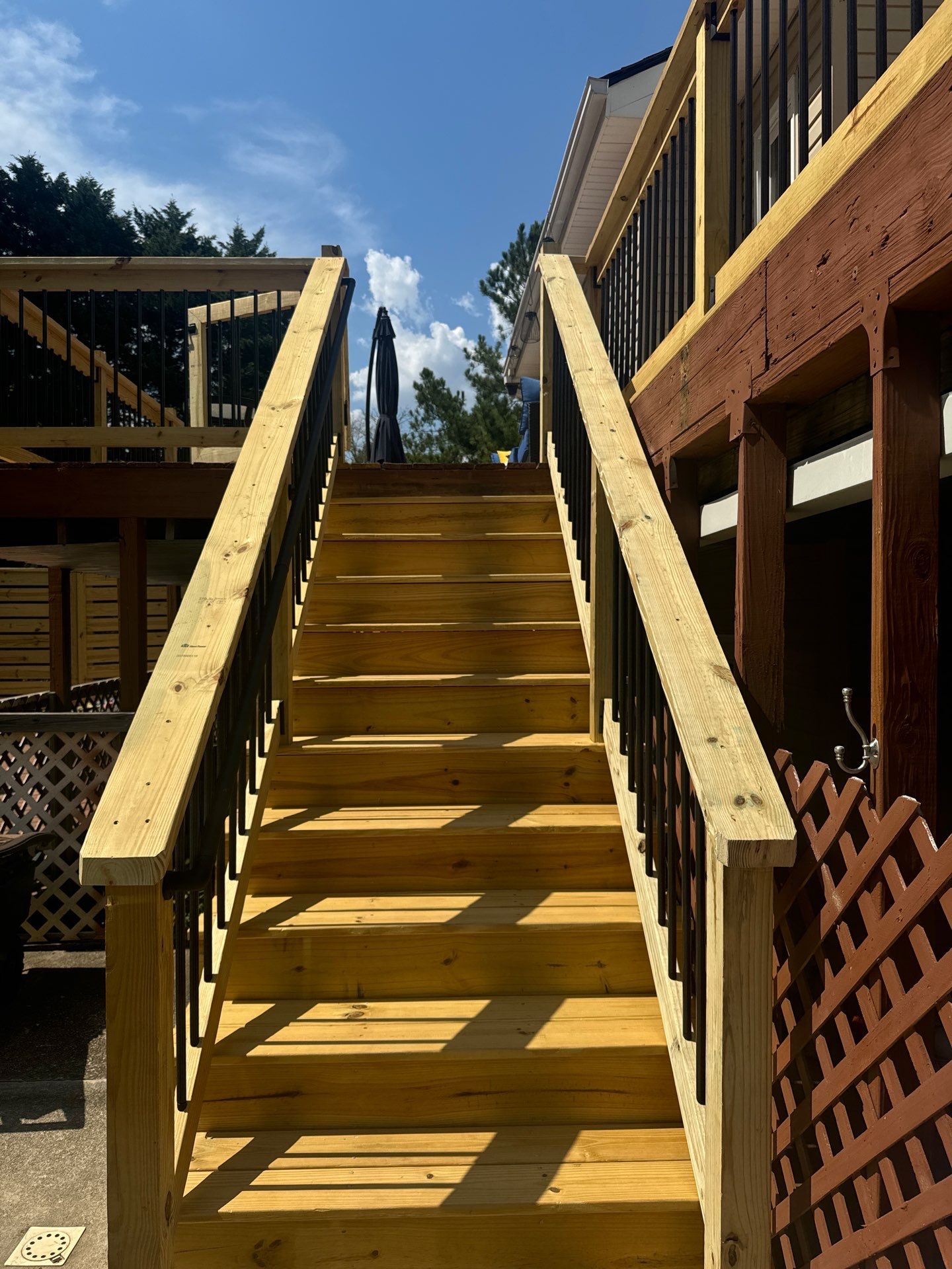 Elevated Deck Construction and Front Porch Renovation in Powder Springs by Swift Home Renovations