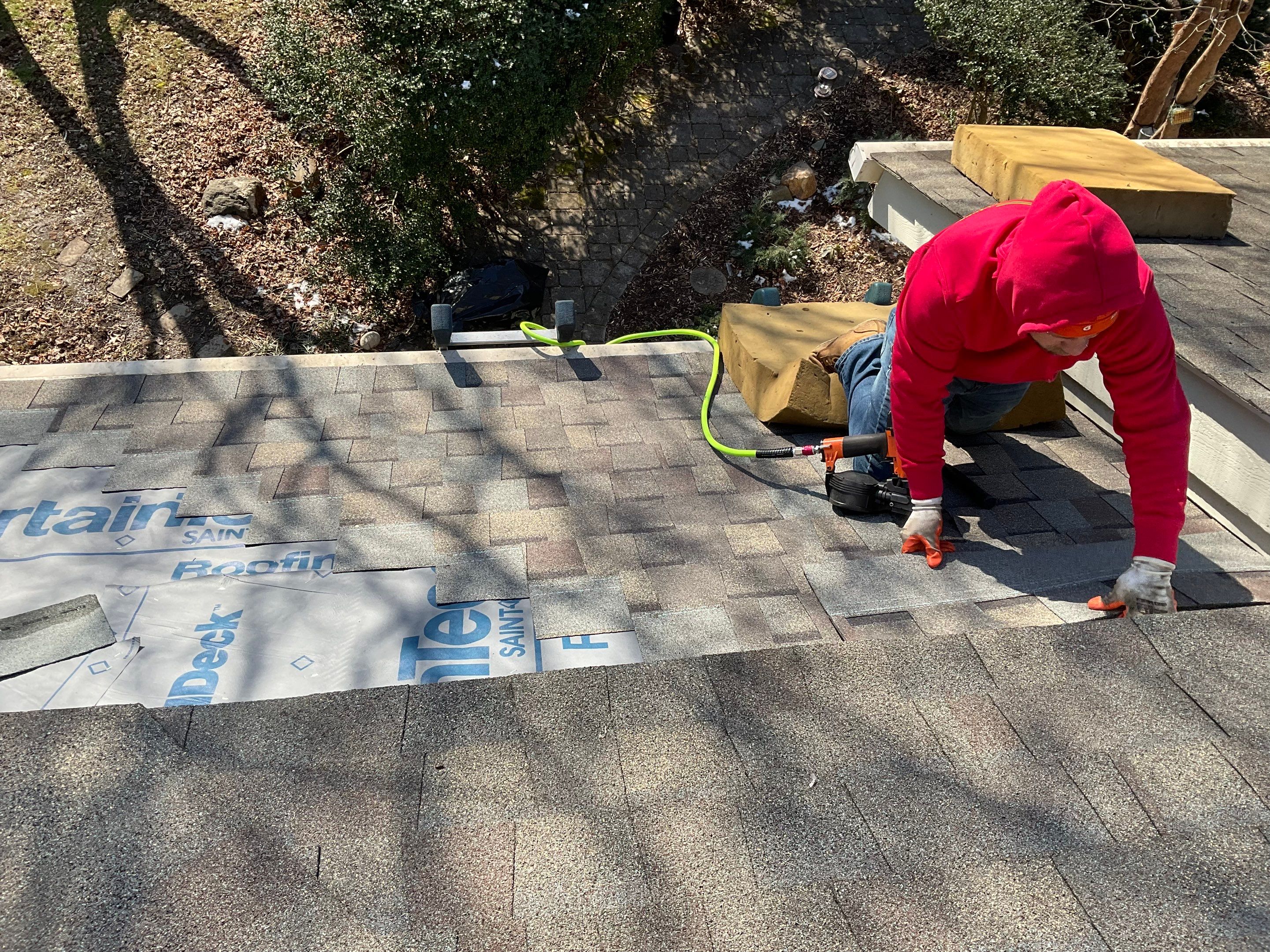 Install new shingles and new skylights  by Alpha Design Services