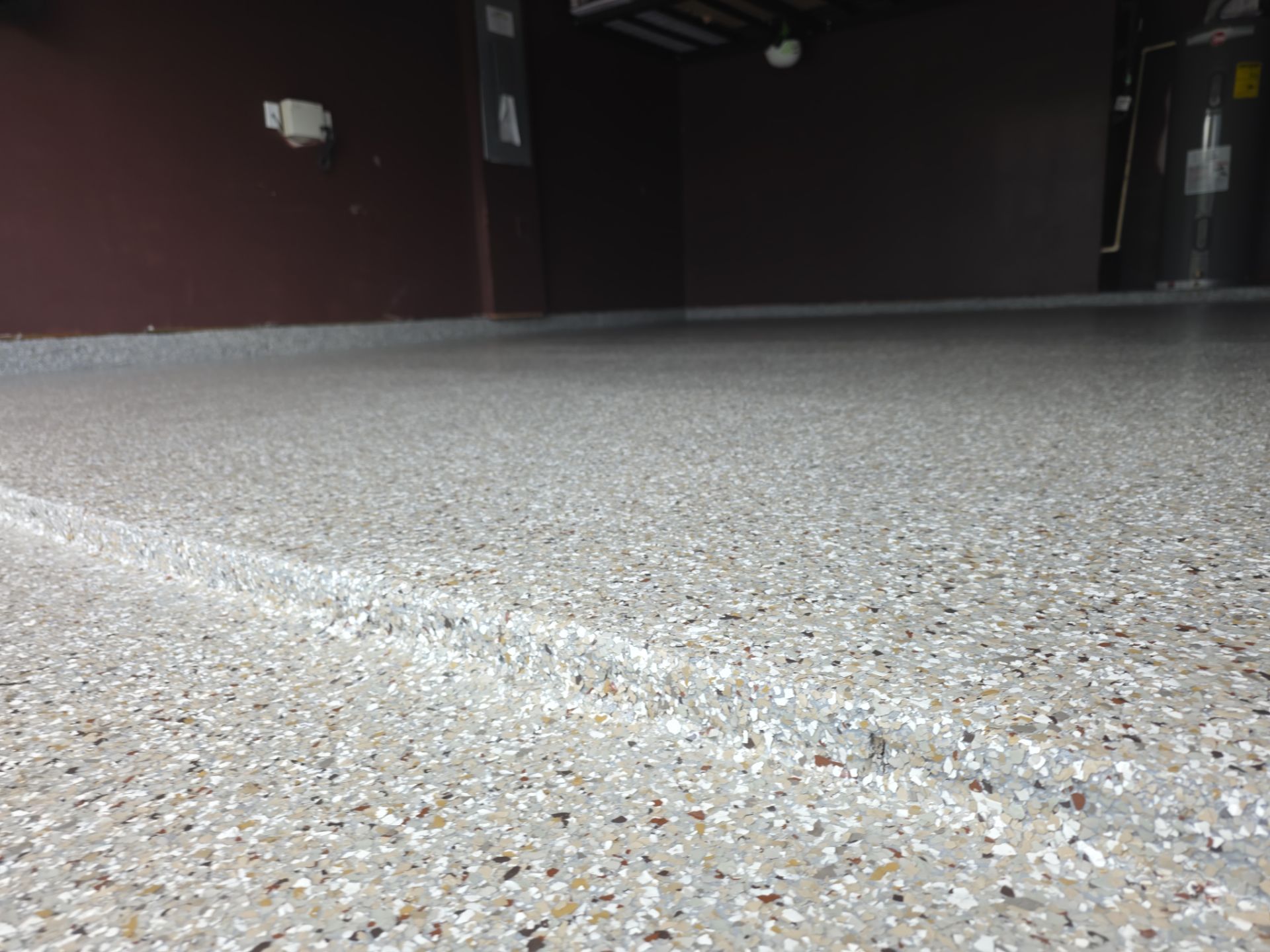 Garage Using Creekbed  by Elite Floor Solutions