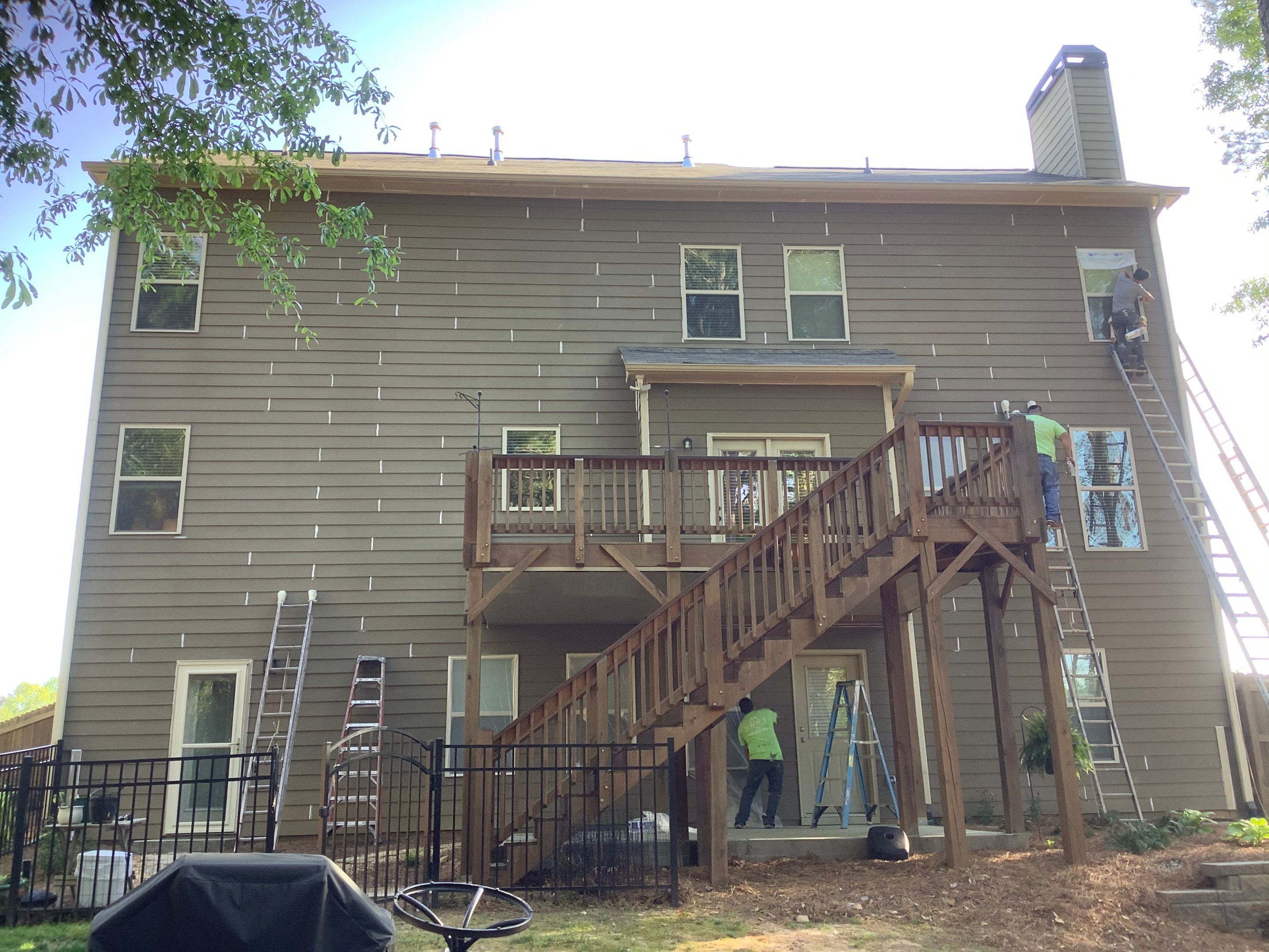 Multi-Surface Exterior Painting for Two-Story Residence in Powder Springs by Swift Home Renovations