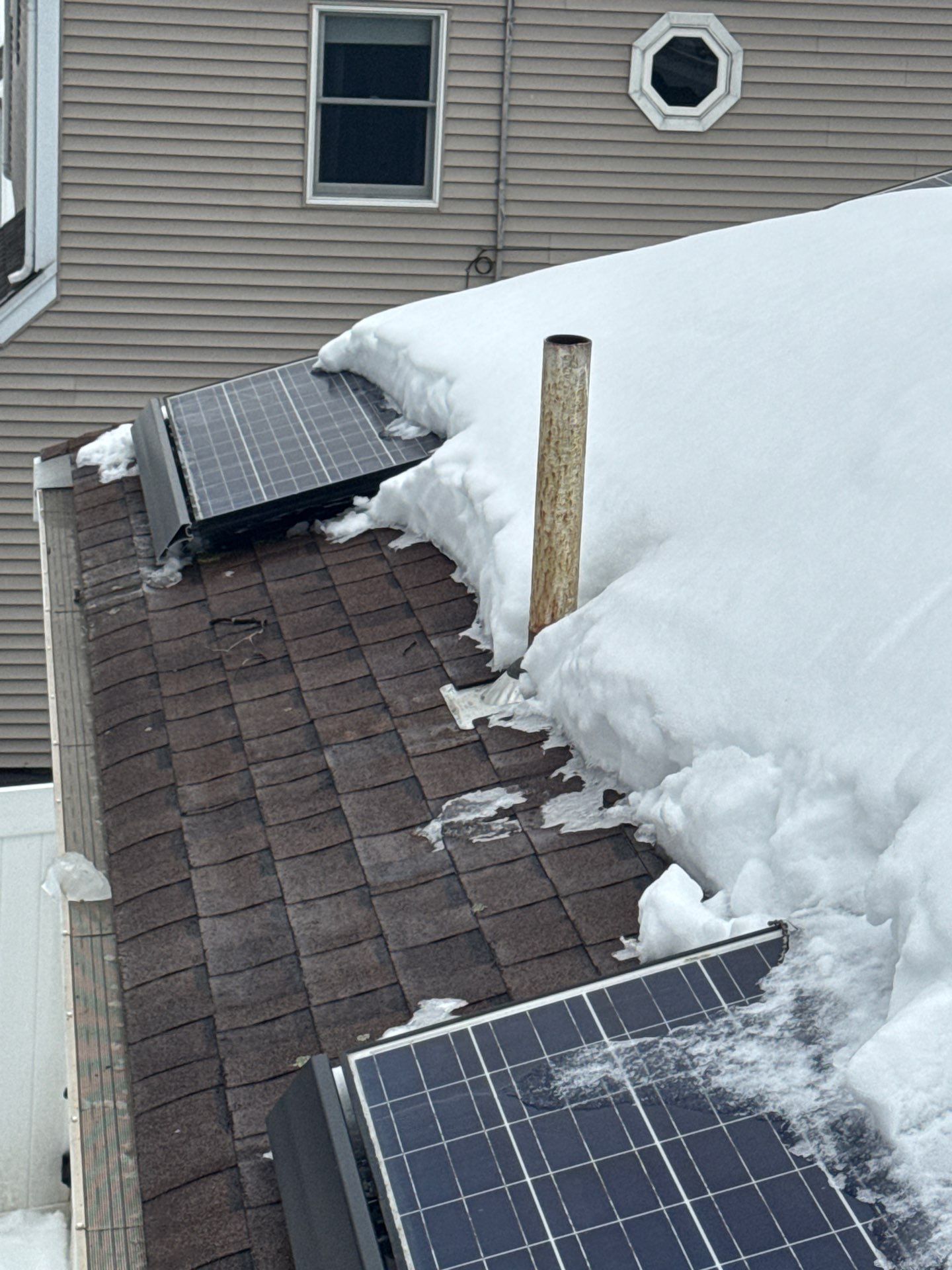 Ice Dam Removal & Snow Removal in Woburn, MA by Mighty Dog Roofing of Greater Middlesex County