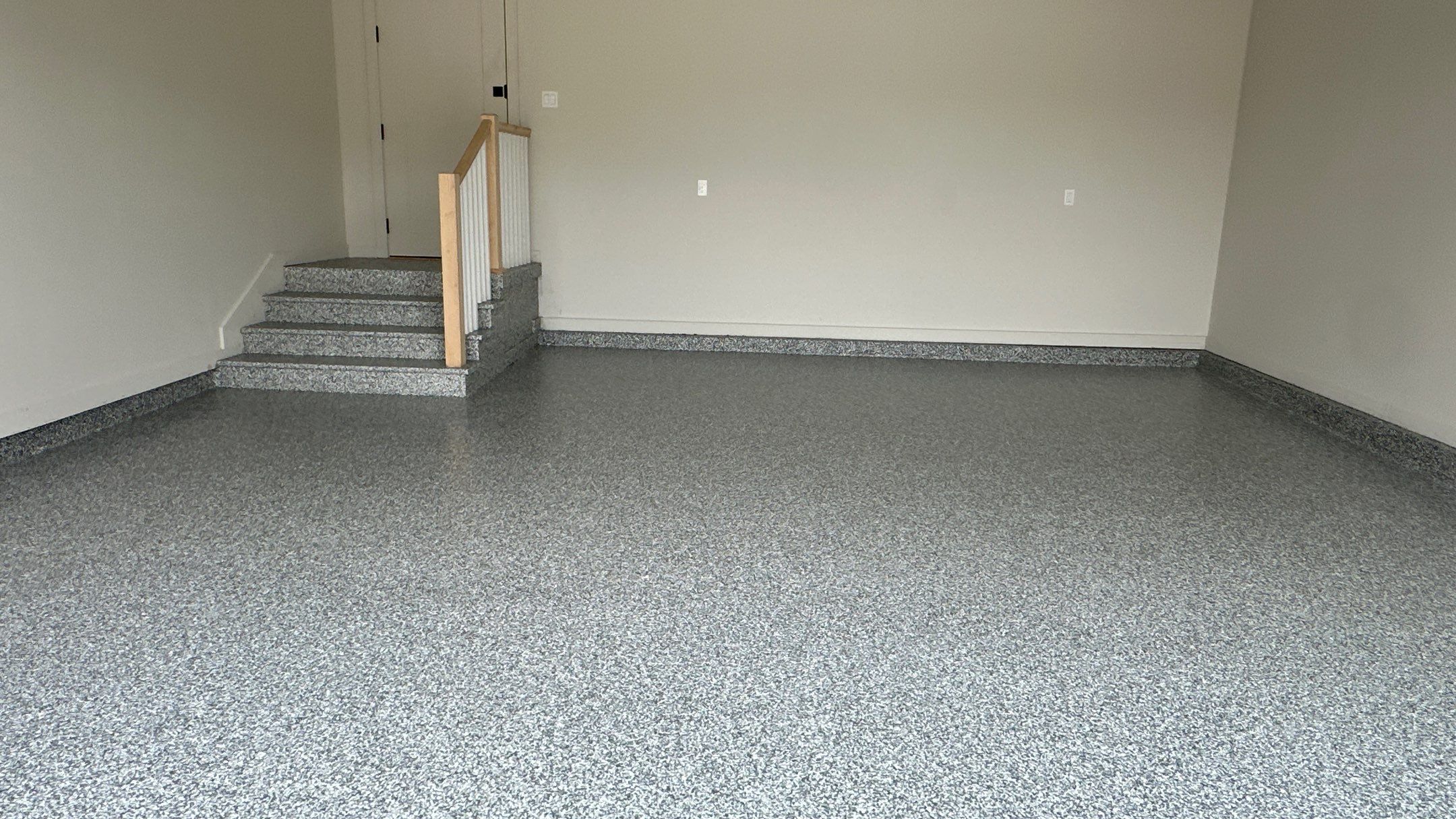 Check out how beautiful a brand new stonehenge flake floor looks by Banner Garage