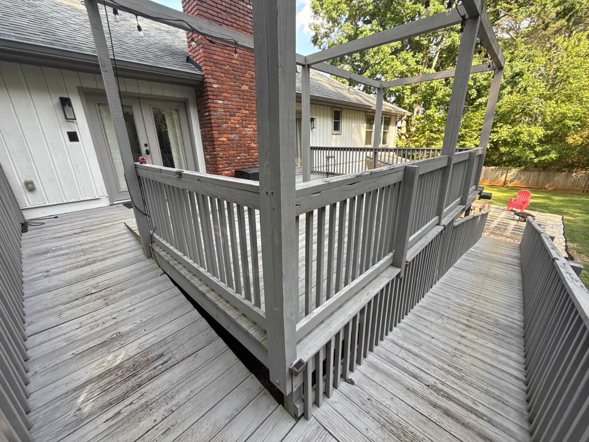 Deck and Shed Roof Style Covered Build using Trex Decking Products by Nelson Exteriors 