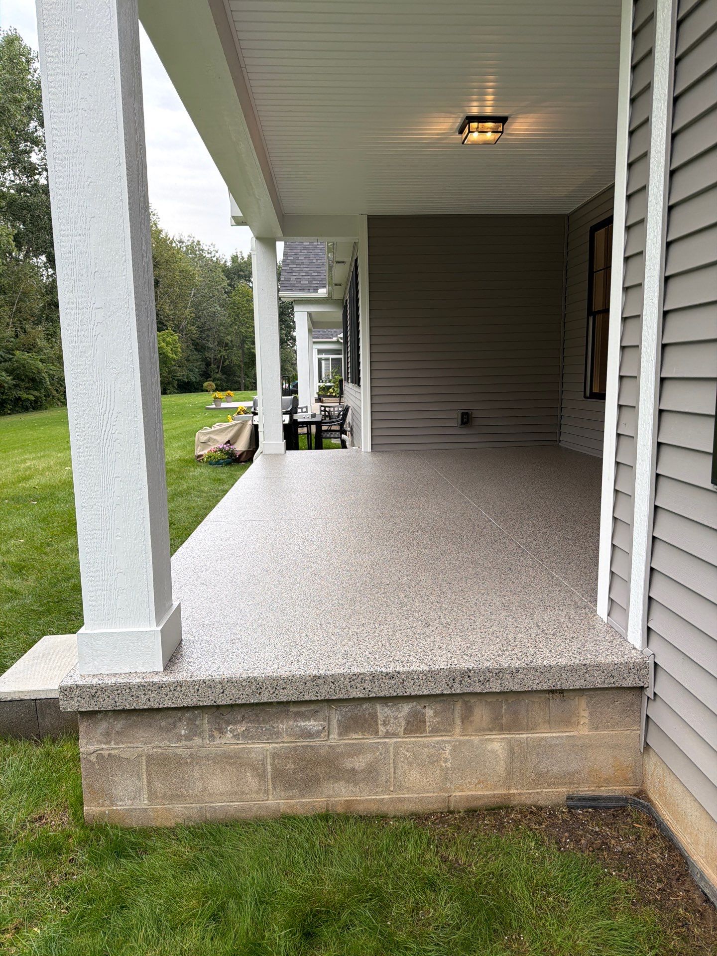 Vintage Goldmine Porch Coating by NG Masonry & Construction LLC
