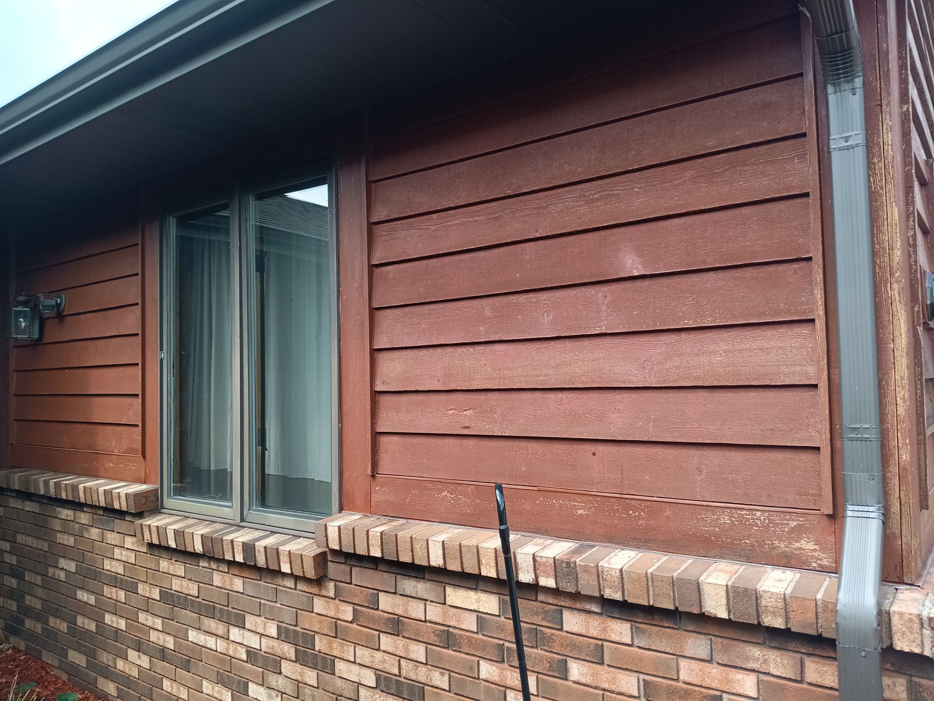 Front of home and garage staining by Gordon Painting