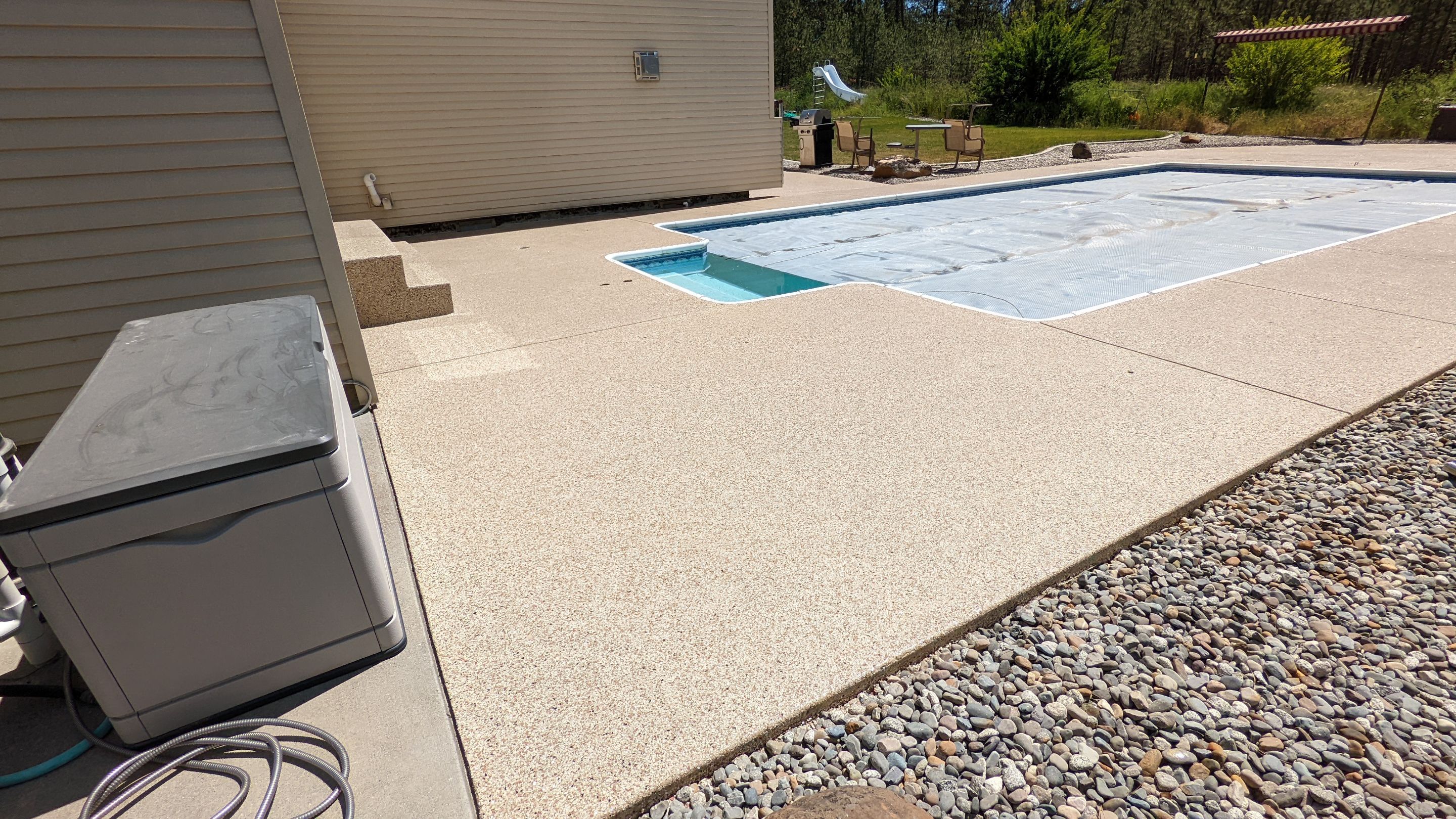Garage Transformation using Domino for Garage and Pecan for Pool Deck by Croc Coatings, LLC