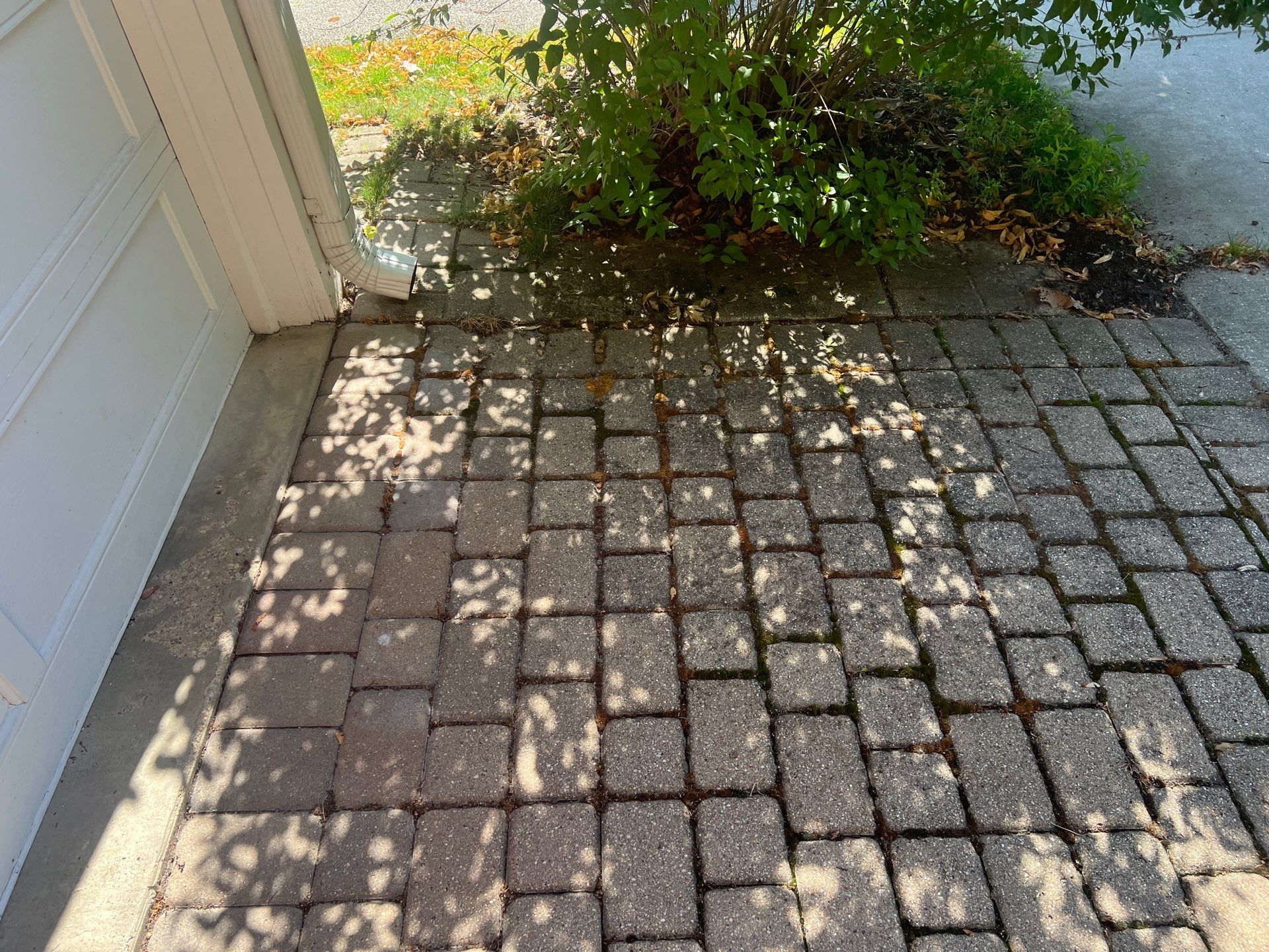 Brick paver cleaning and sealing by Northern Power Washing LLC.