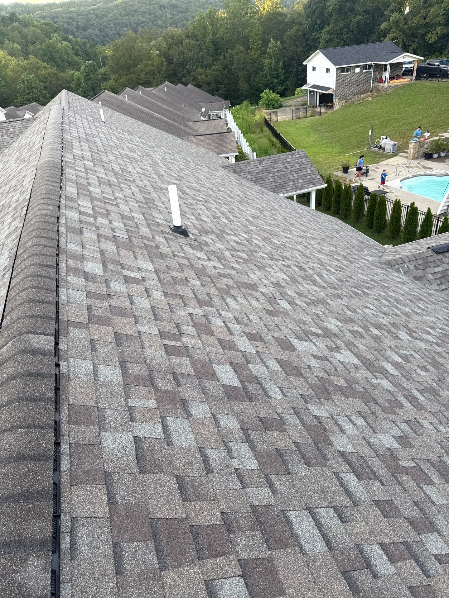 Residential Roofing Installation using Driftwood by Rainstoppers Roofing