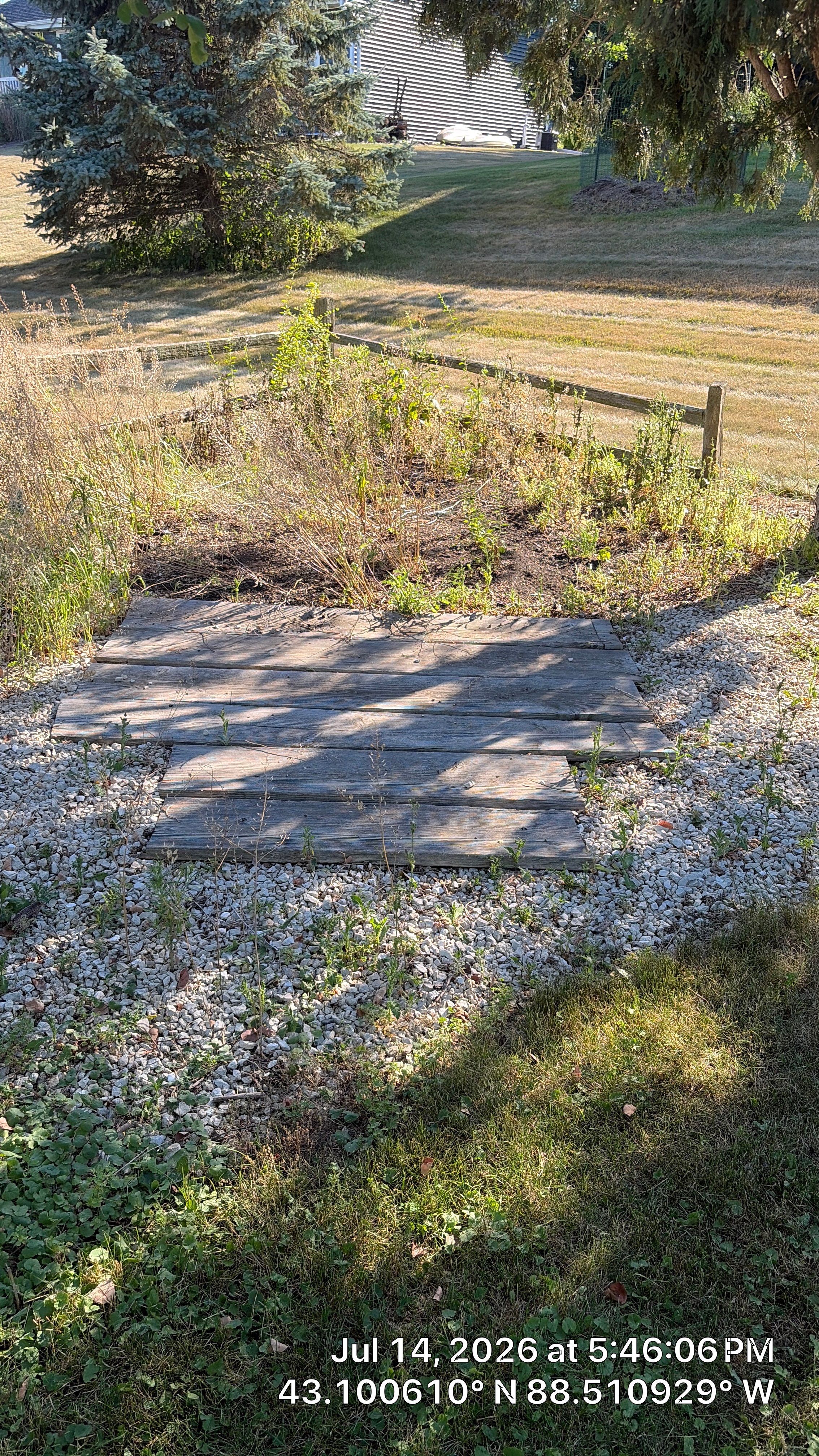 Decorative Stone and River Rock Landscaping for Oconomowoc Residence by CompanyCam Sales Demo
