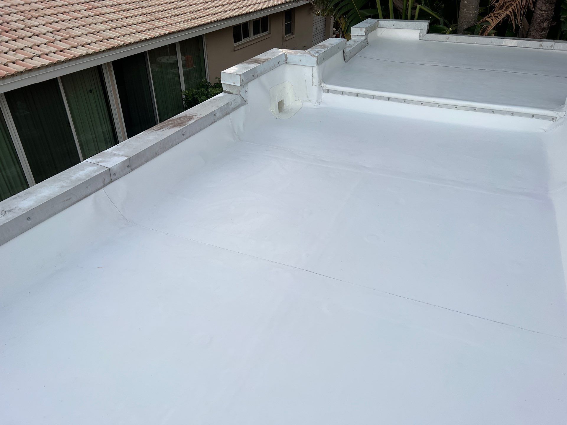 TPO on Flat Roof by Durabilis Roofing INC