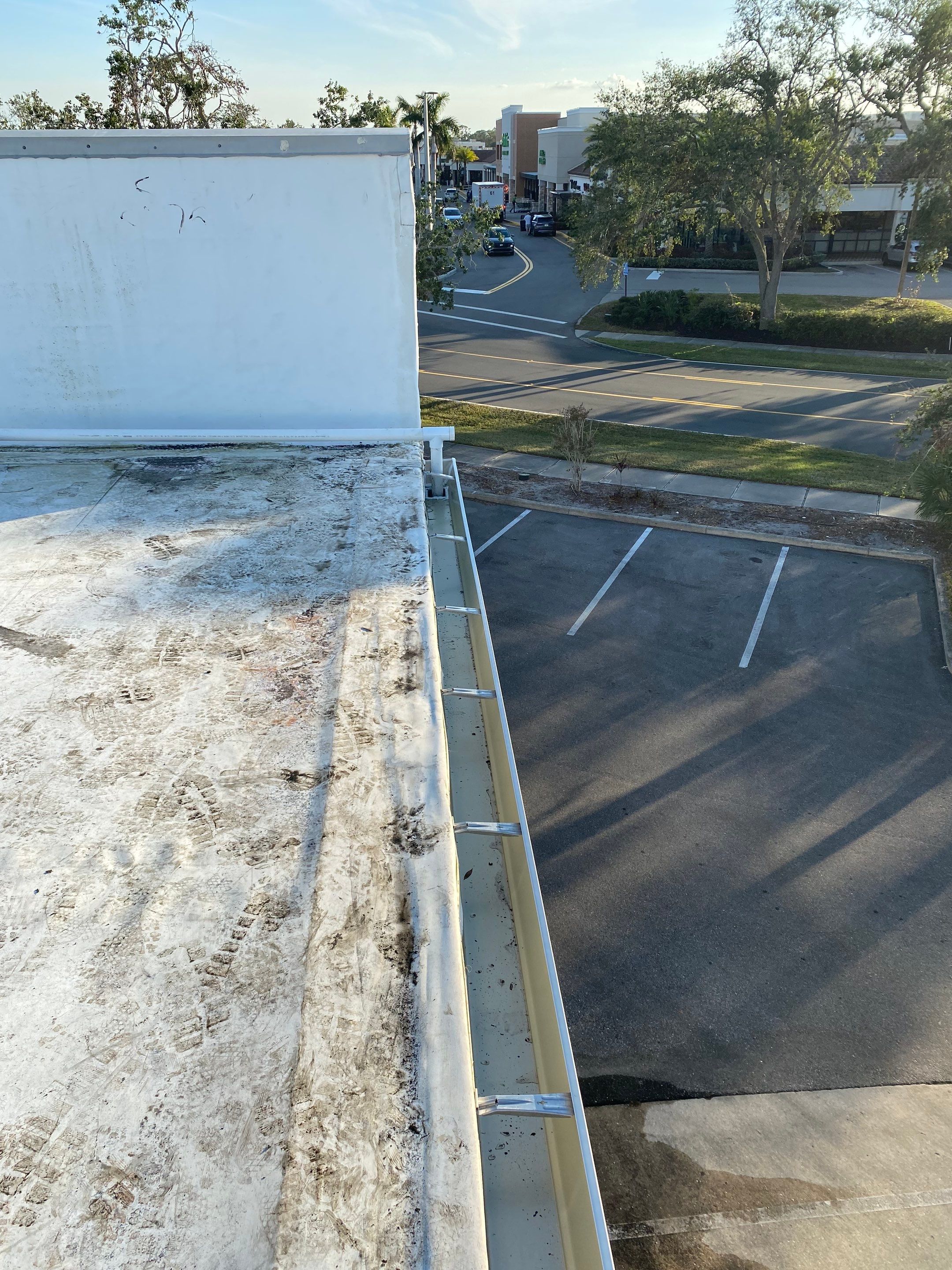 7-Inch Seamless Gutters for Commercial Installation in Sarasota FL by Gutter Professors