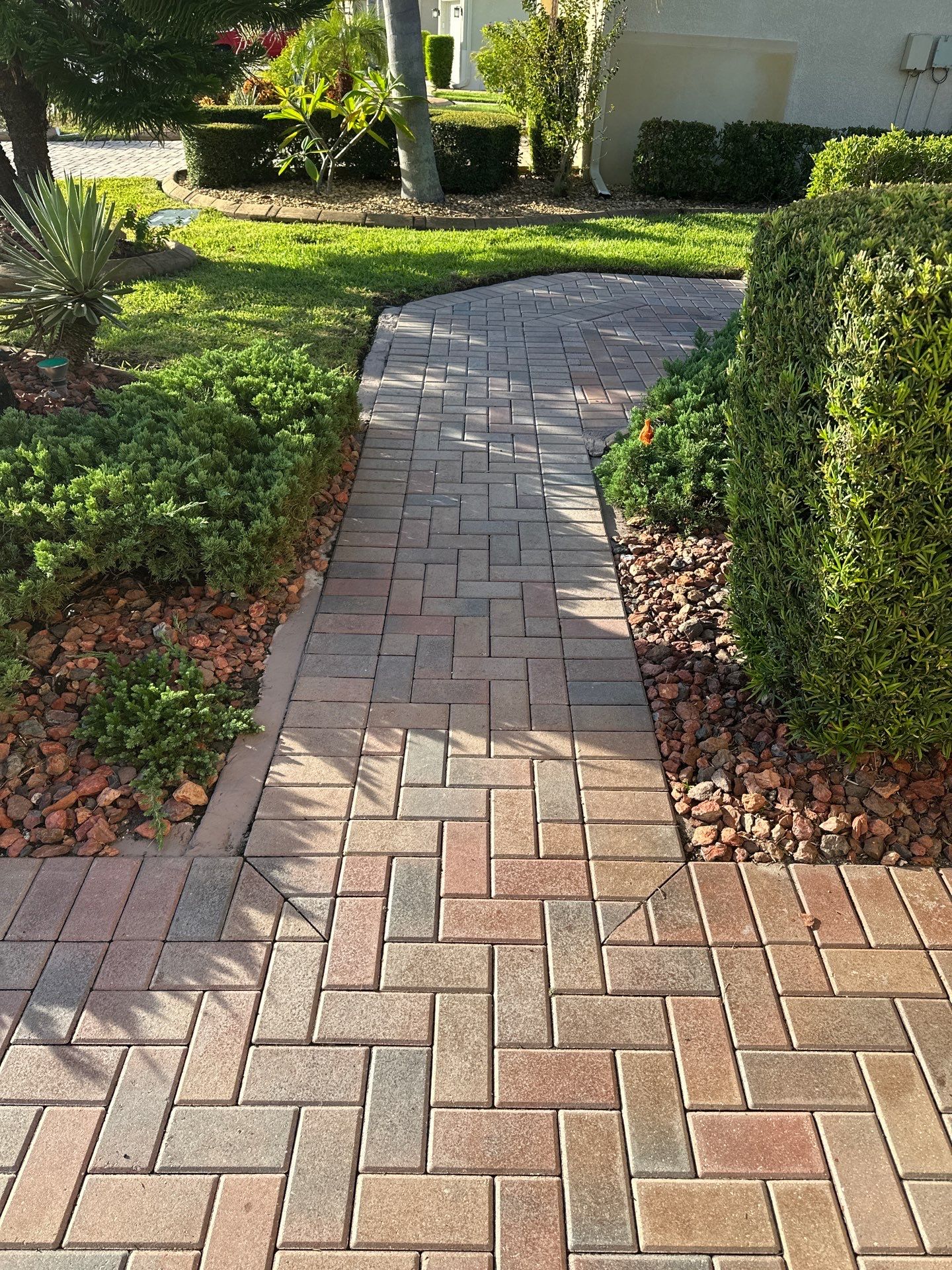 Restoring Multi-Tone Paver Driveway and Walkways in Sun City Center by Supreme Paver Experts