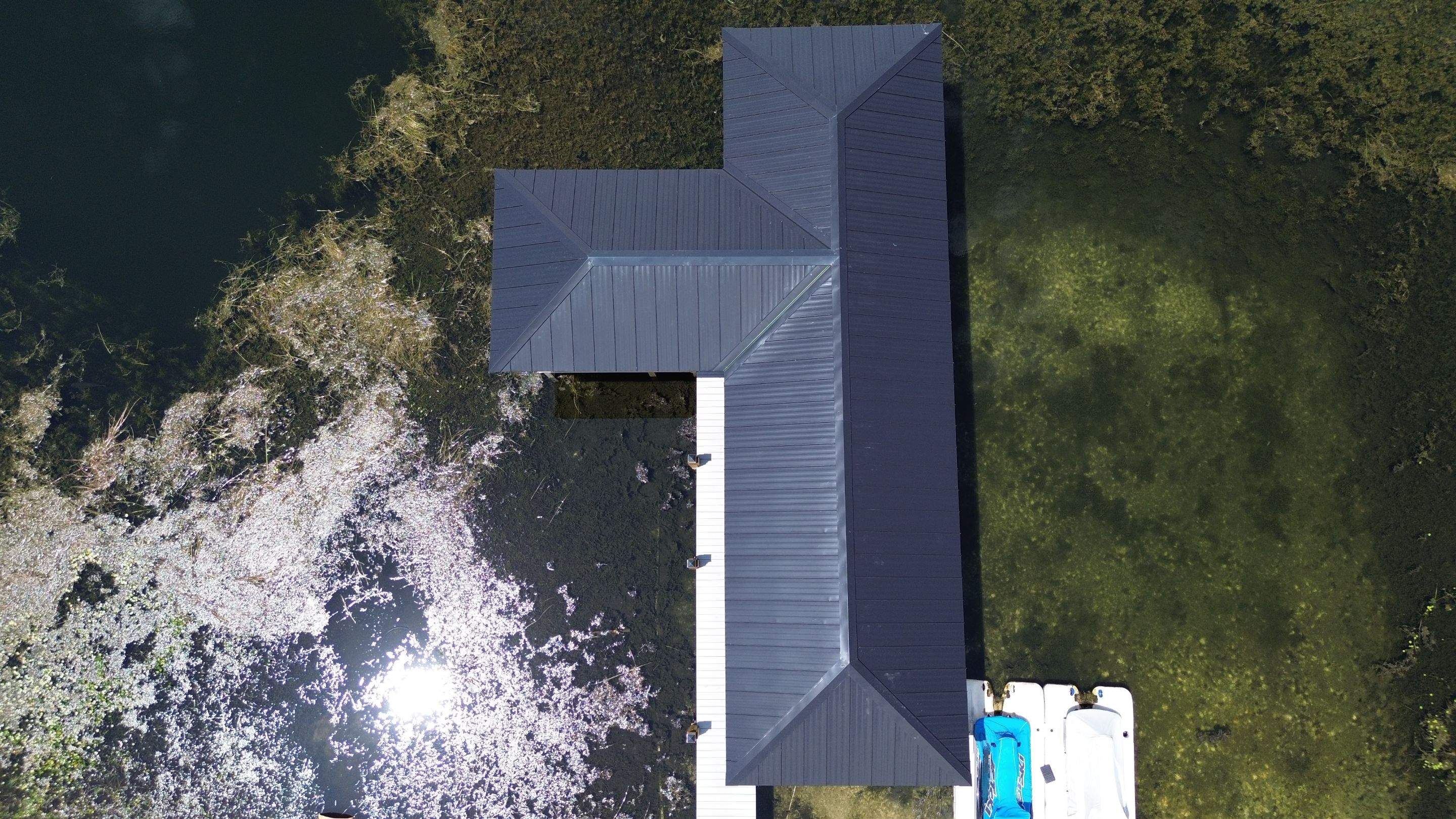 Residential Dock reroof  by Gold Key Roofing