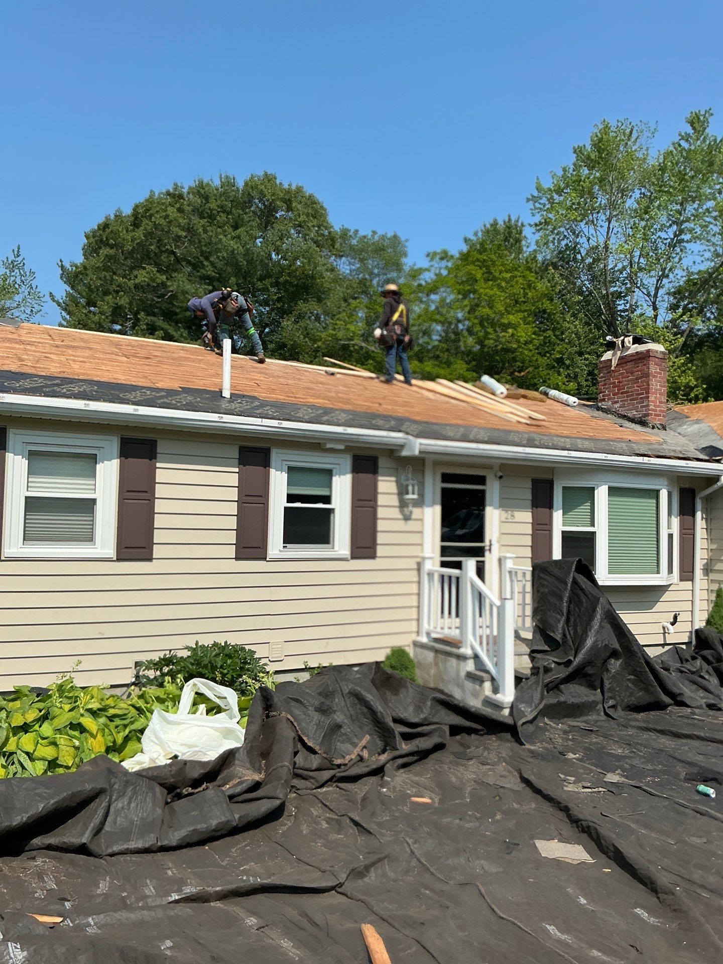 Full Roof Replacement & Chimney Repair – Onyx Black, MA by Mighty Dog Roofing of Greater Middlesex County