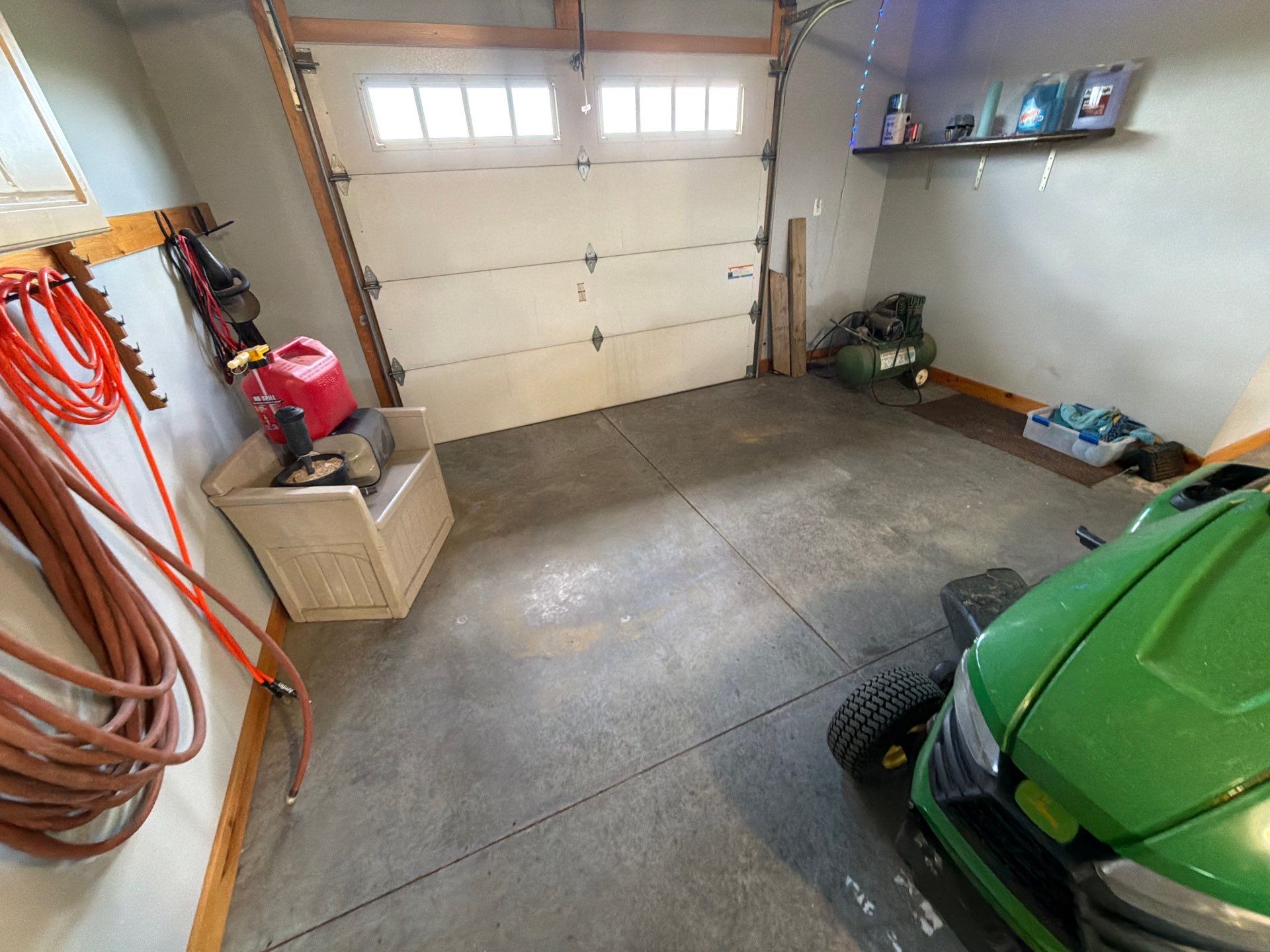 Multi-Car Garage Concrete Coating and Floor Refinishing in Hull by Select Painting, Coatings & Garage Cabinets