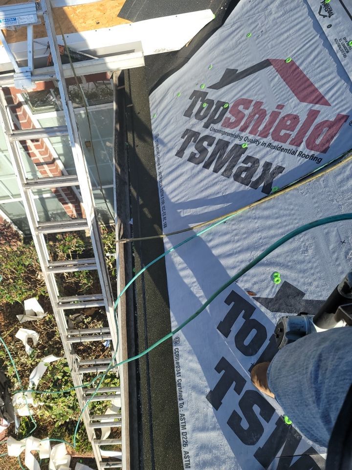 Residential Roofing Installation using Roof Replacement by American Roofing & Construction LLC