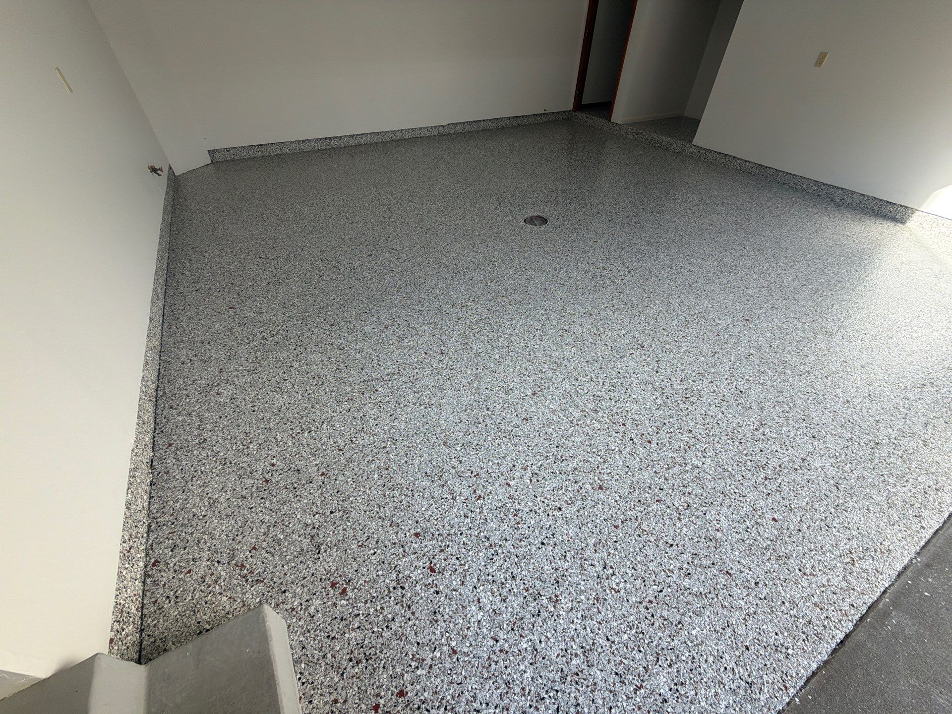 Custom Epoxy Flake Floor Coating and Ceiling Repair in Muskegon by Gordon Painting