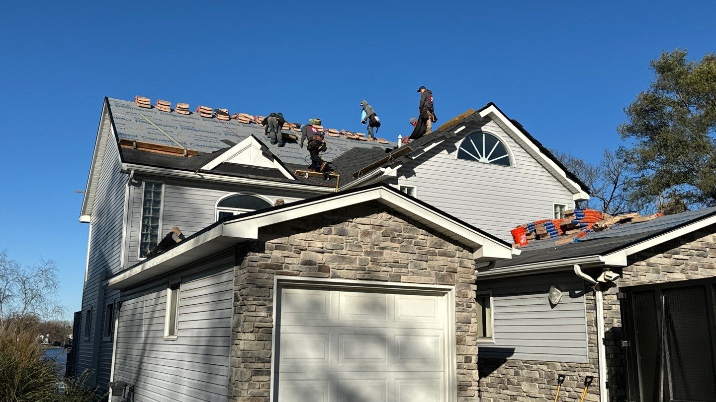 Roof Replacement using CertainTeed Landmark Moire Black by 180 Contractors