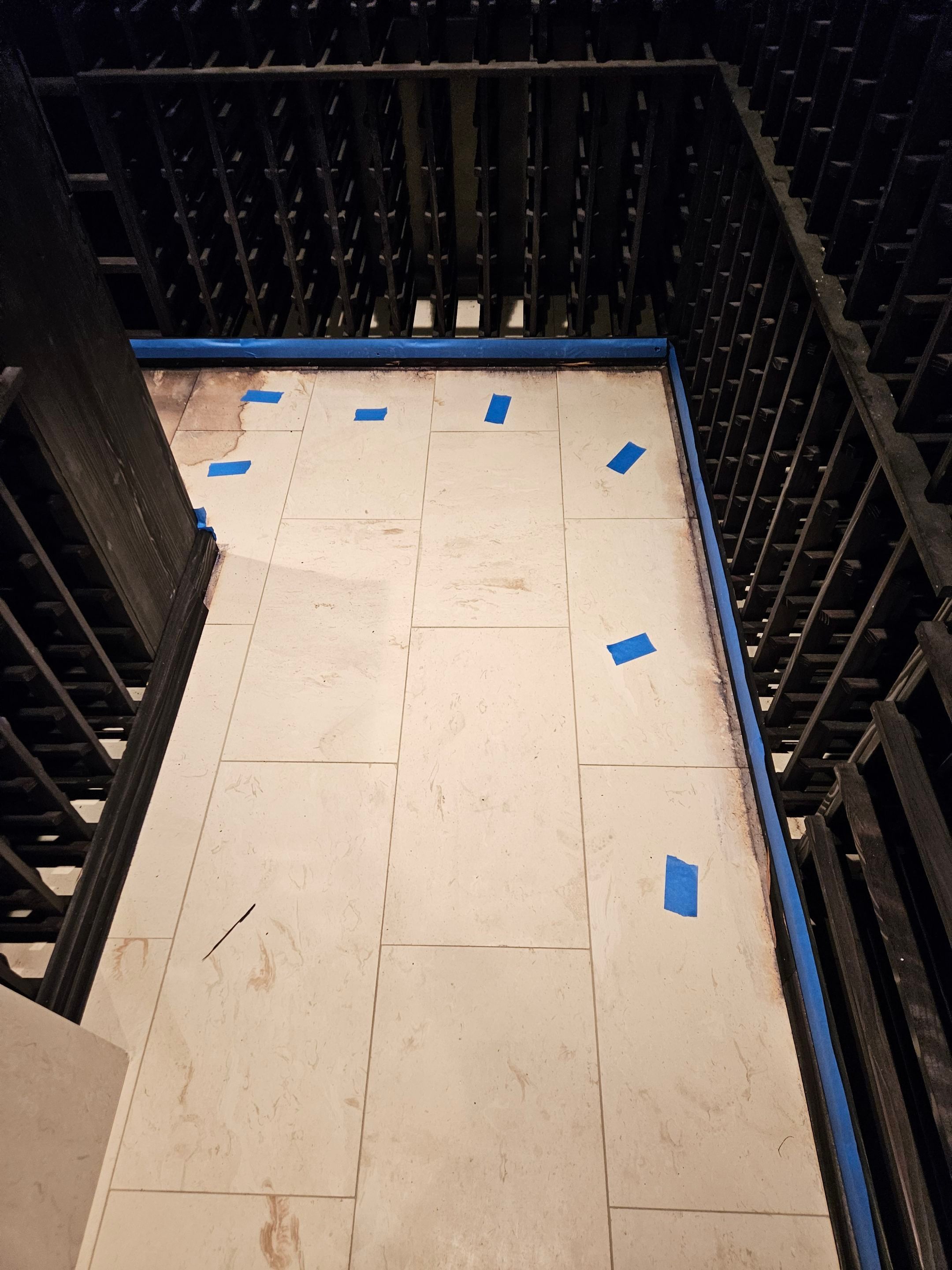 Replaced Stained Wine Cellar Tiles  by Footprints Floors of Nashville