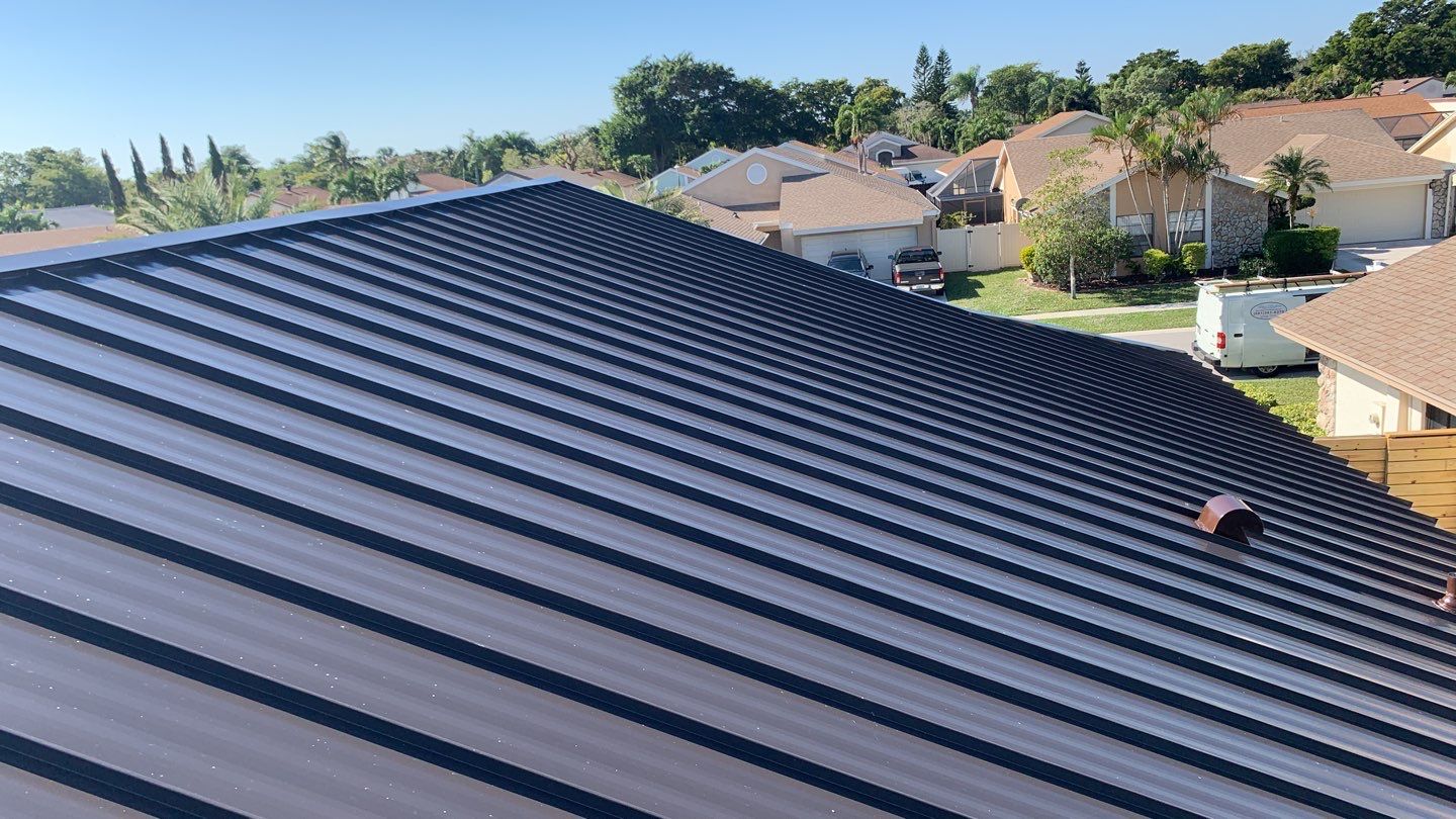 Residential Roofing Installation using 1" Nail strip metal roof by BLUES BROTHERS CONSTRUCTION CORP