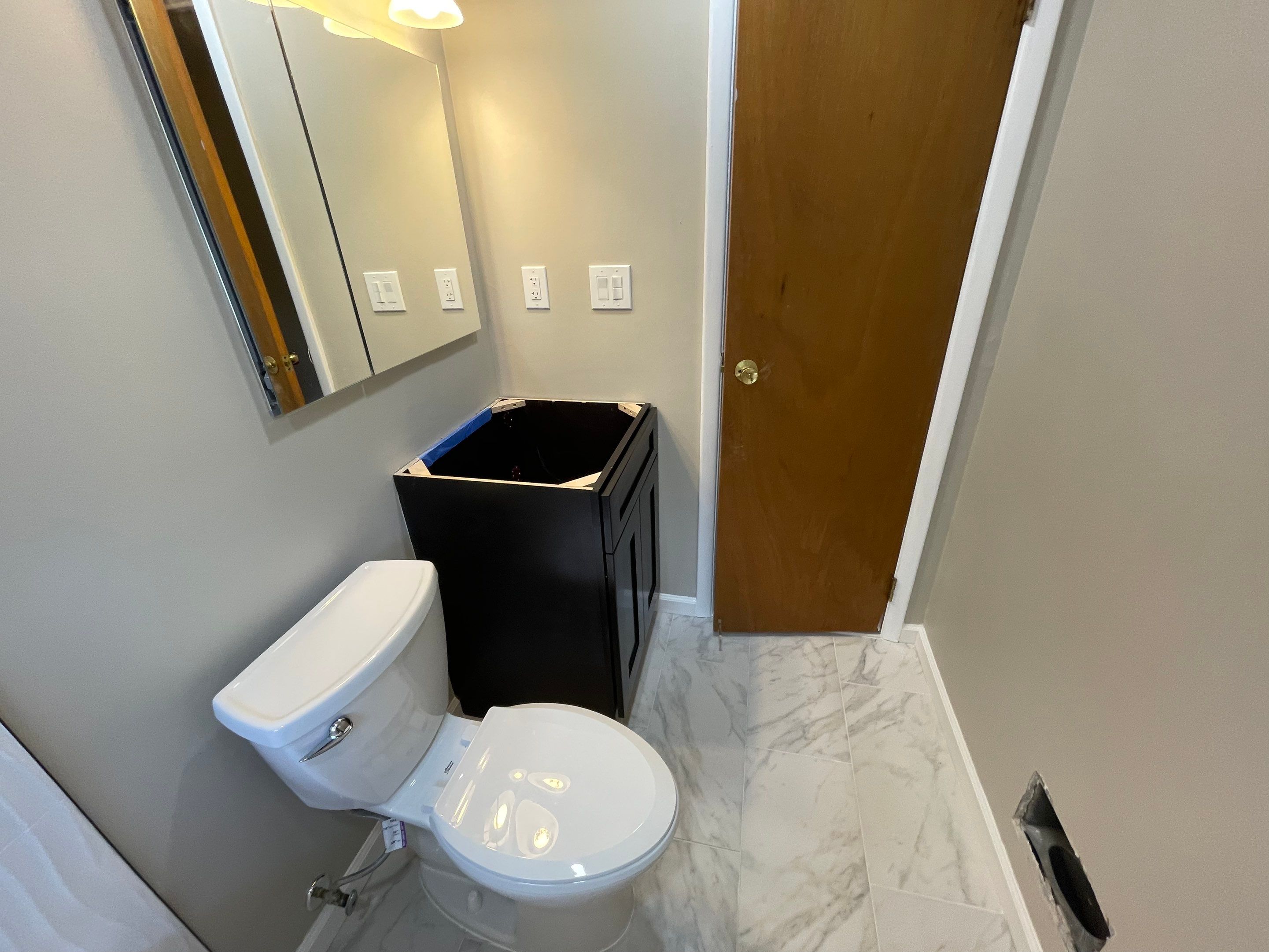 Bathroom Remodel using Tile by Home Concepts Construction