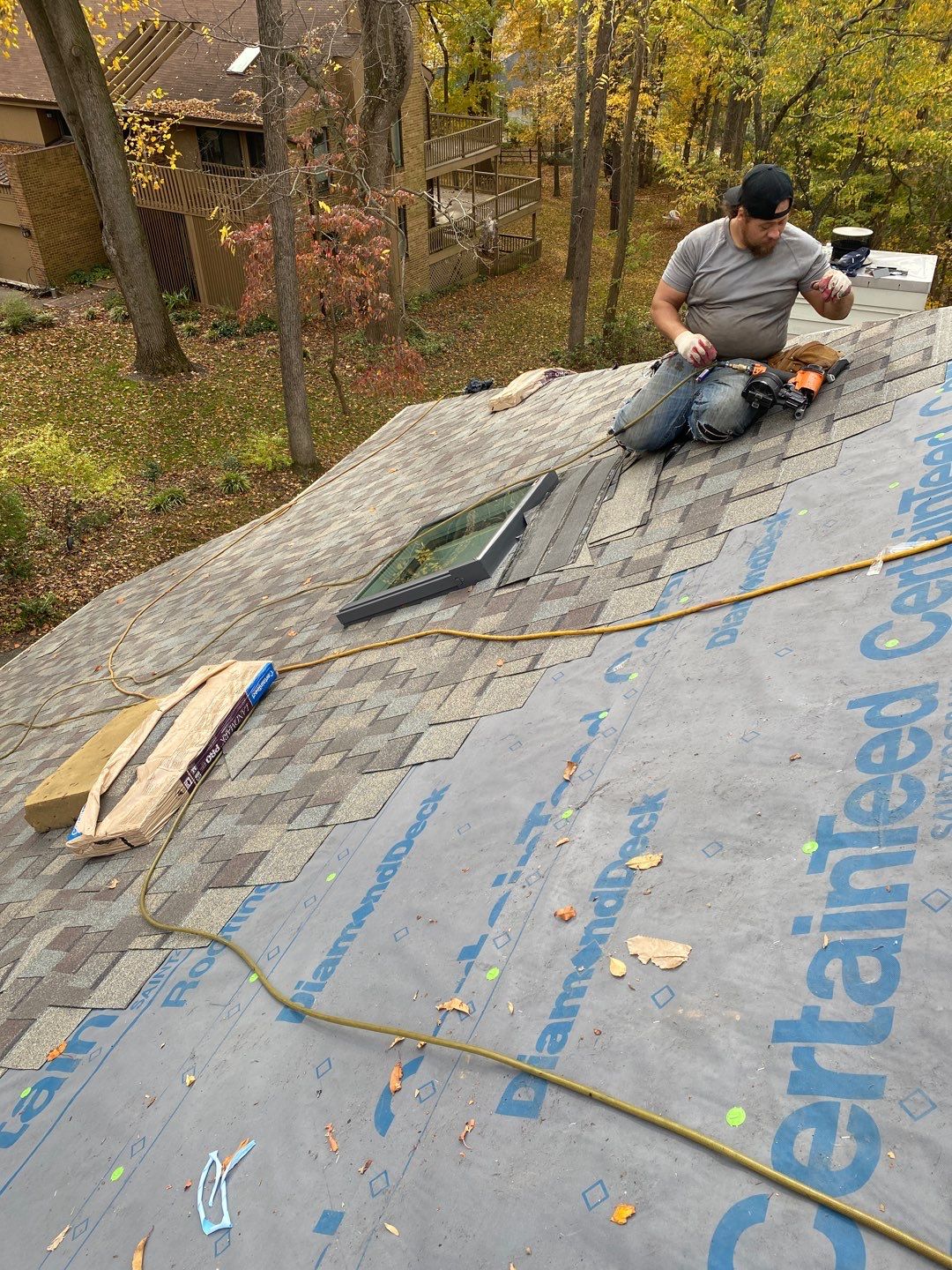 Install new shingles and new skylights  by Alpha Design Services