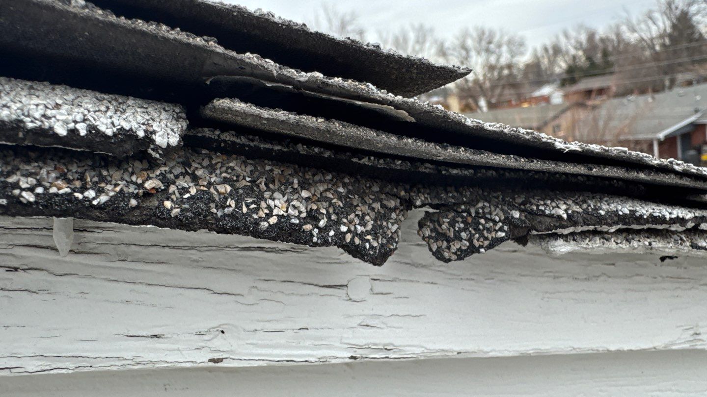2 layers of 3-Tab shingles! by Modern Roofing Group